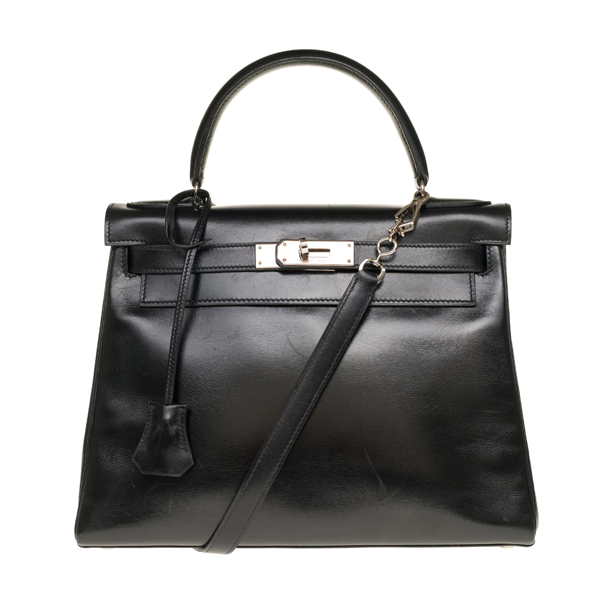 Black Hermès Kelly 28cm shoulder bag with strap in black calfskin and silver hardware