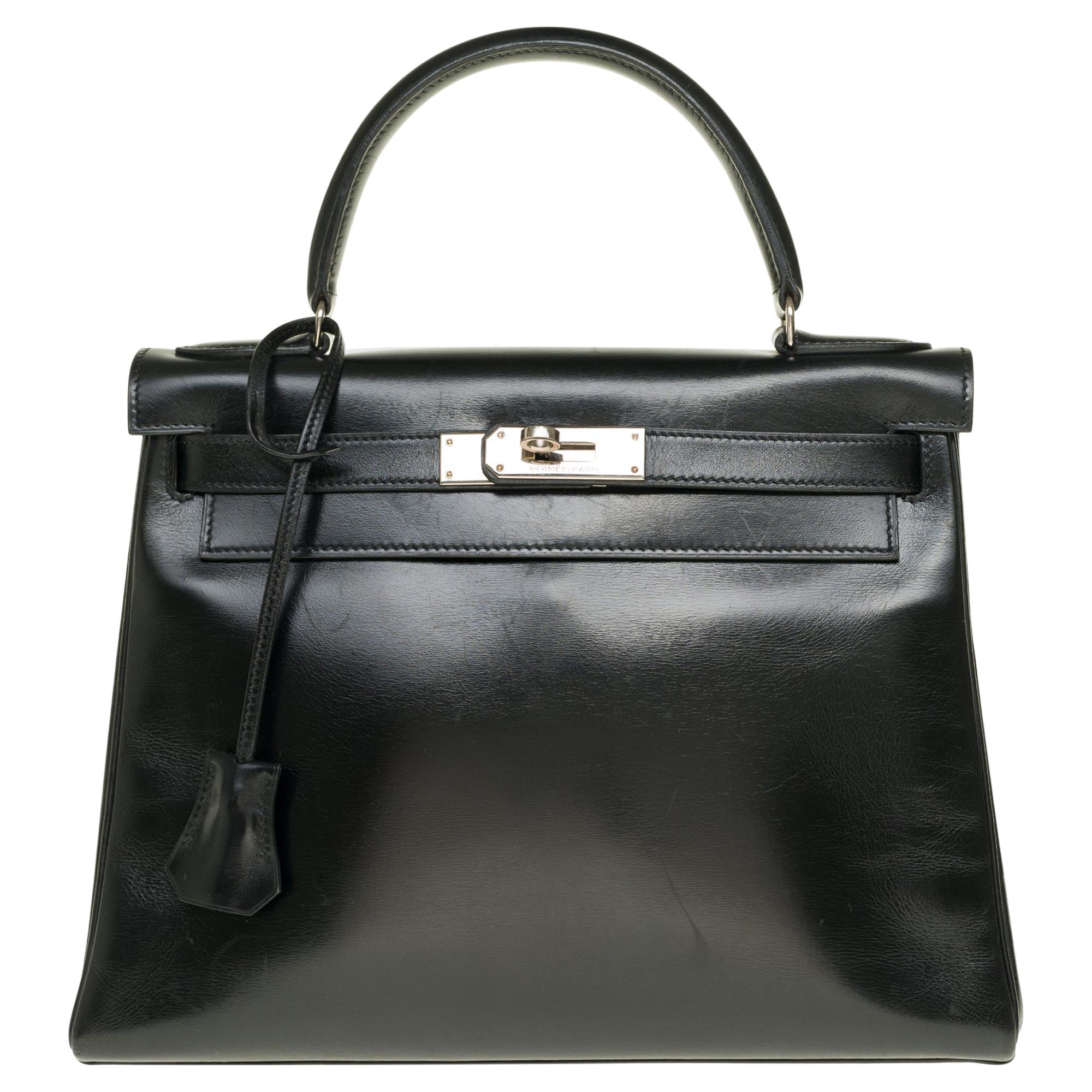 Hermès Kelly 28cm shoulder bag with strap in black calfskin and silver hardware