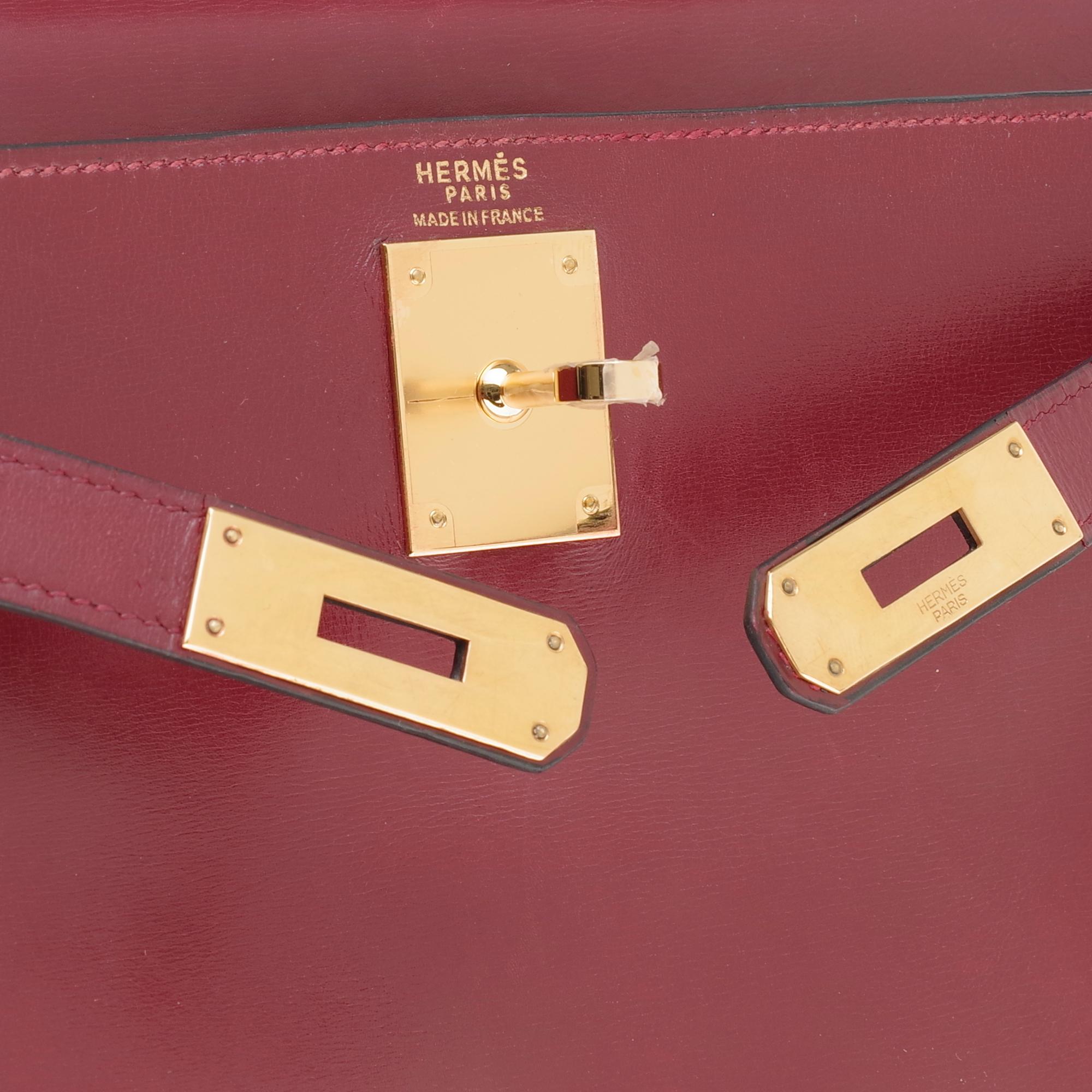 Pink Hermès Kelly 28cm retourné handbag in burgundy box calfskin with Gold hardware