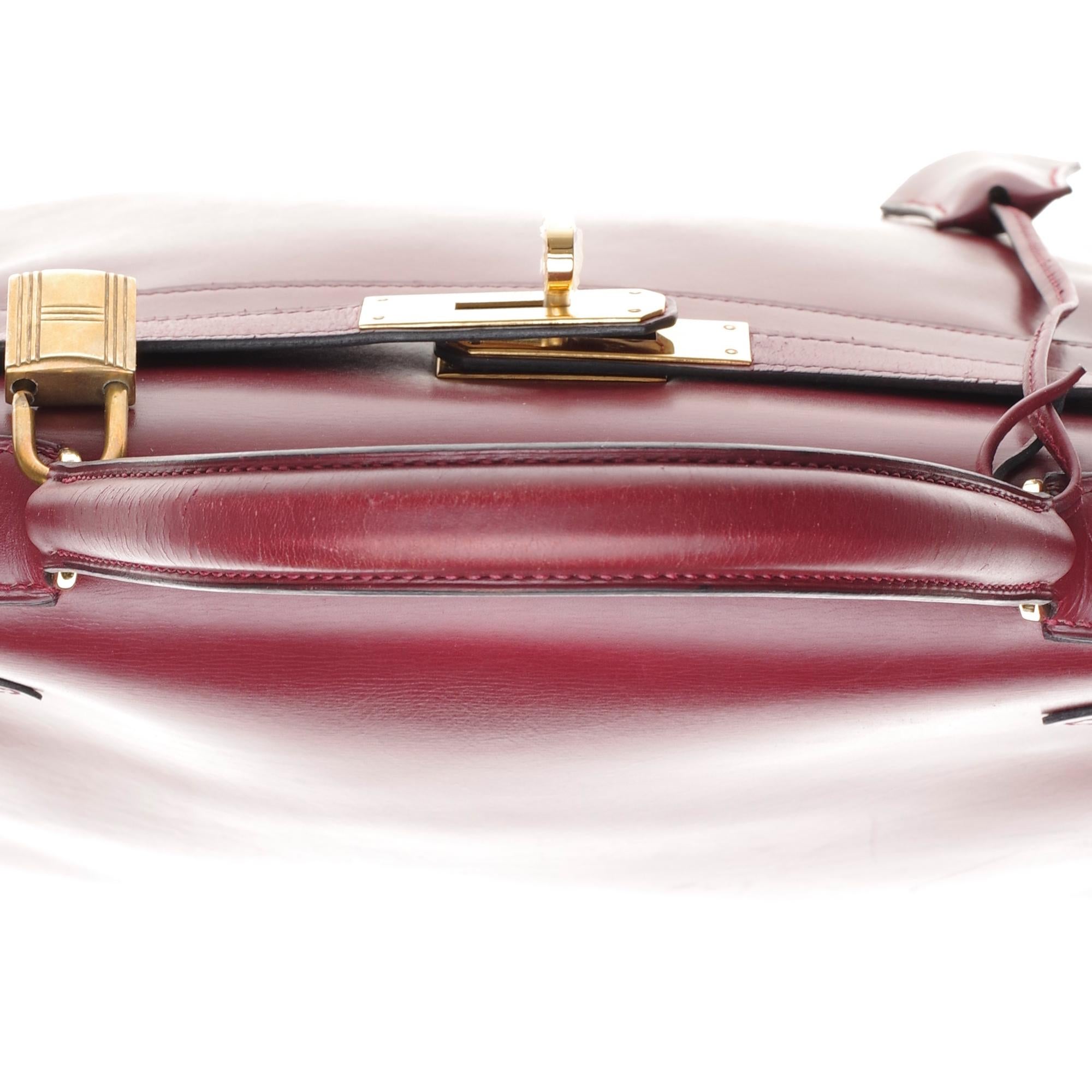 Hermès Kelly 28cm retourné handbag in burgundy box calfskin with Gold hardware 1