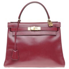 Hermès Kelly 28cm retourné handbag in burgundy calfskin Gold hardware