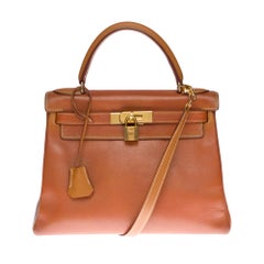 Hermès Kelly 28cm retourné handbag with strap in Gold Courchevel leather, GHW