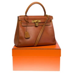 Hermès Kelly 28cm retourné handbag with strap in Gold Courchevel leather, GHW