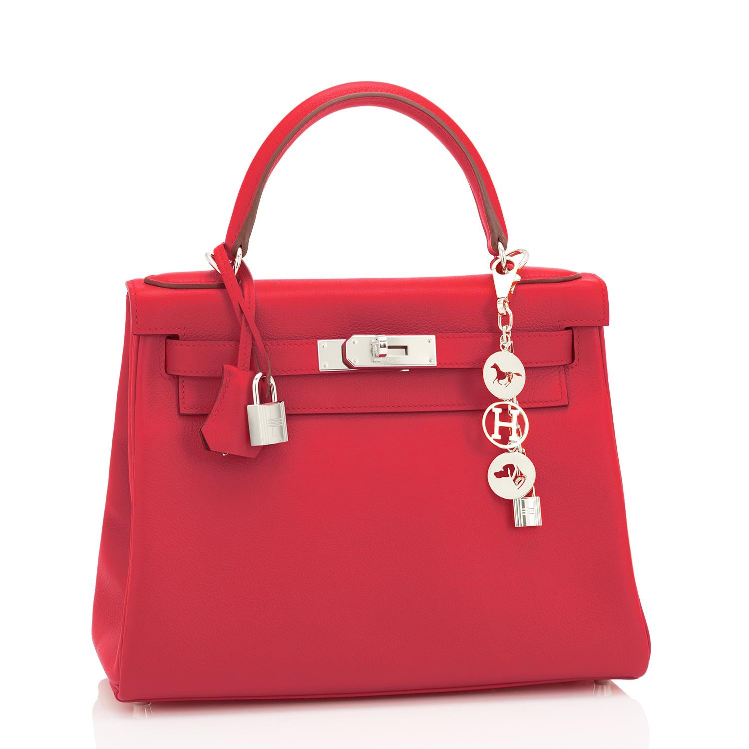 Hermes Kelly 28cm Rouge de Coeur Grenat Lipstick Red Shoulder Bag Z Stamp, 2021
Every woman needs a sexy red Kelly!
Perfect gift! Comes with shoulder strap, keys, lock, clochette, sleepers, rain protector, and orange Hermes box. 
Just purchased from