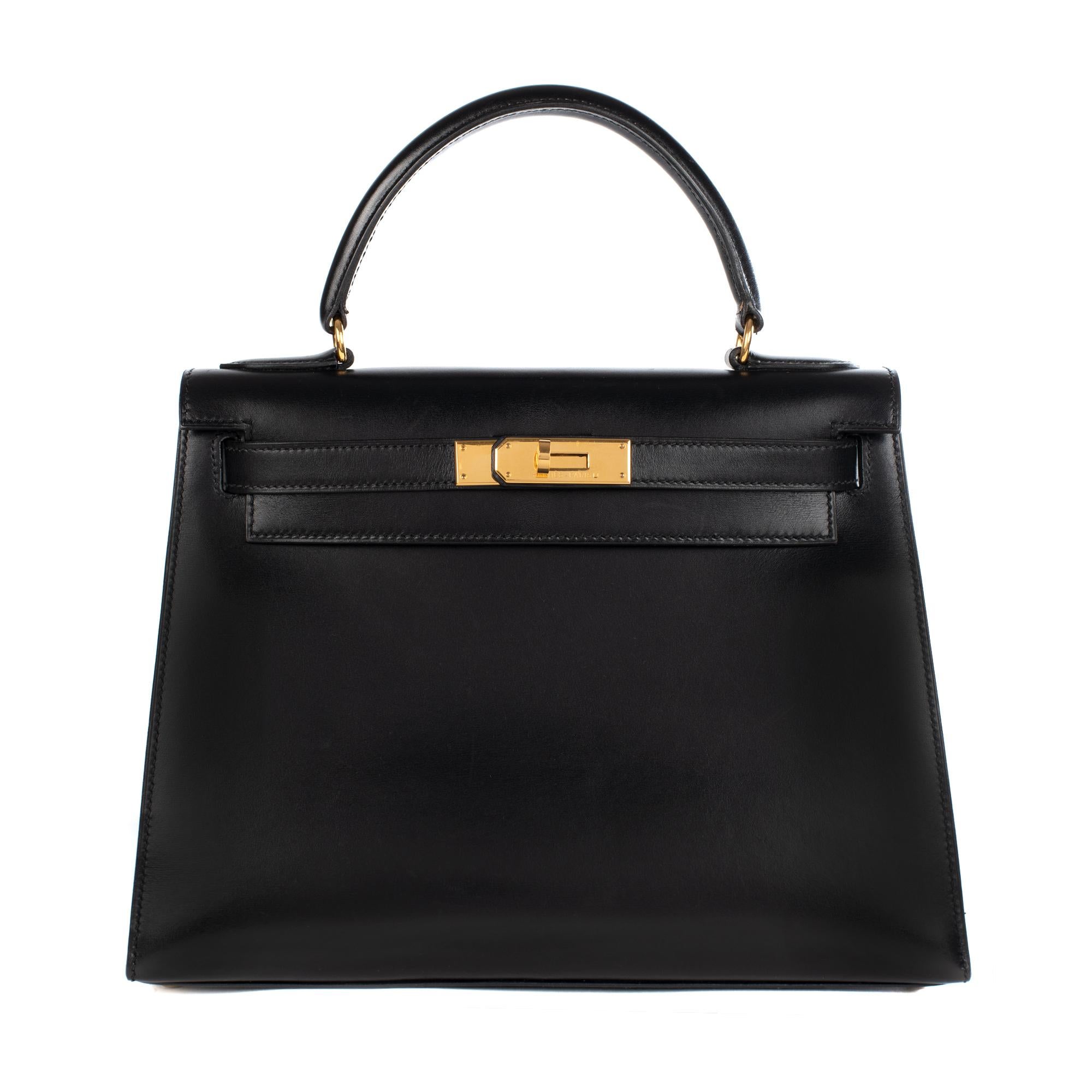 Orange Hermès Kelly 28cm sellier with strap handbag in black calfskin Gold hardware