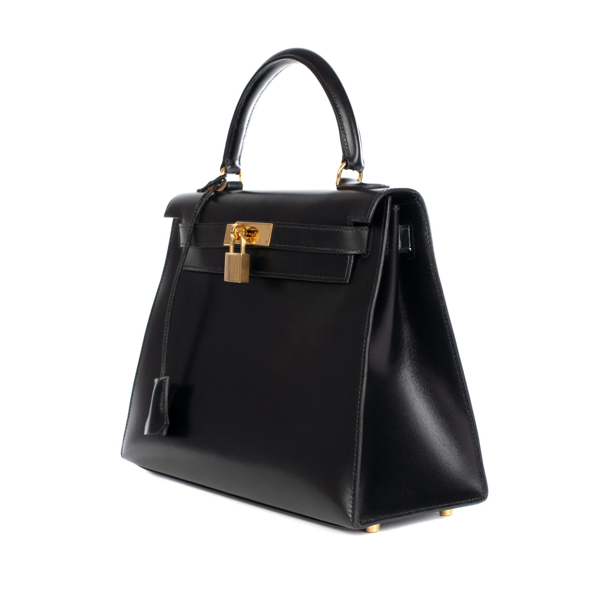 Hermès Kelly 28cm sellier with strap handbag in black calfskin Gold hardware 1