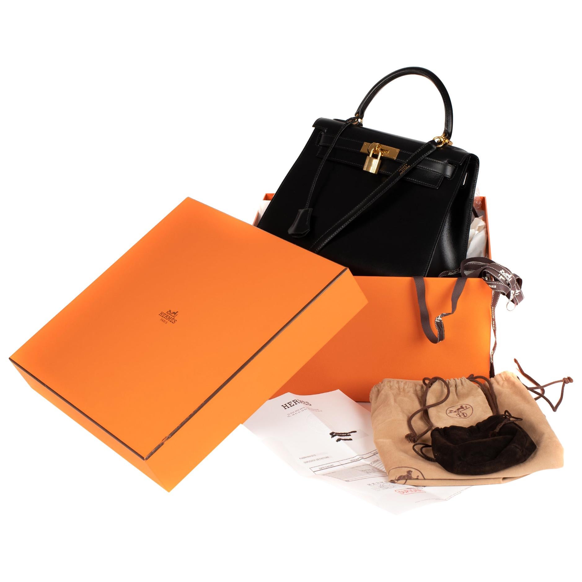 Hermès Kelly 28cm sellier with strap handbag in black calfskin Gold hardware