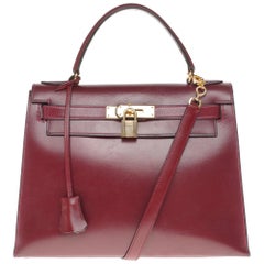 Hermès Kelly 28cm sellier avec sangle sac à main en veau bordeaux:: matériel doré