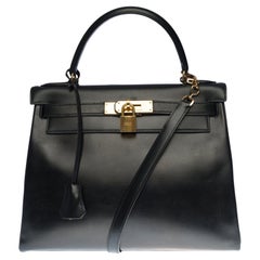 Hermès Kelly 28cm shoulder bag with strap in black box calfskin, GHW