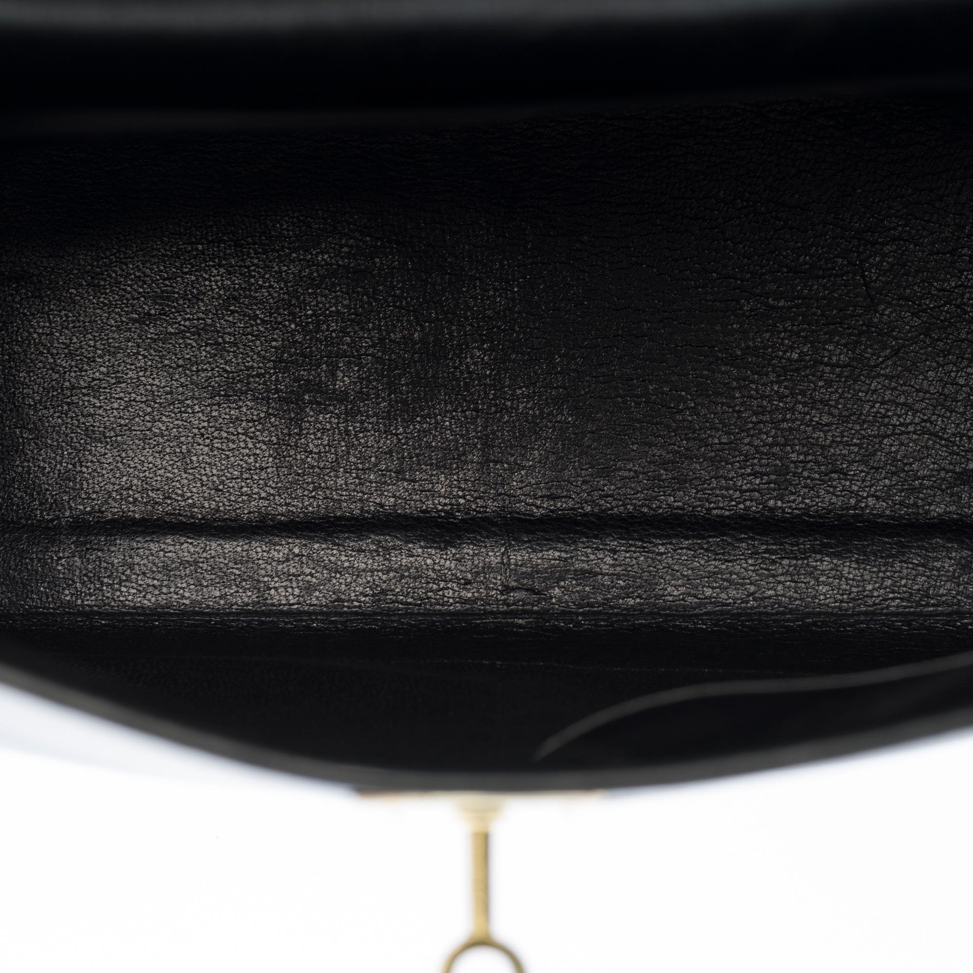 Hermès Kelly 28cm shoulder bag with strap in black calfskin and gold hardware 1