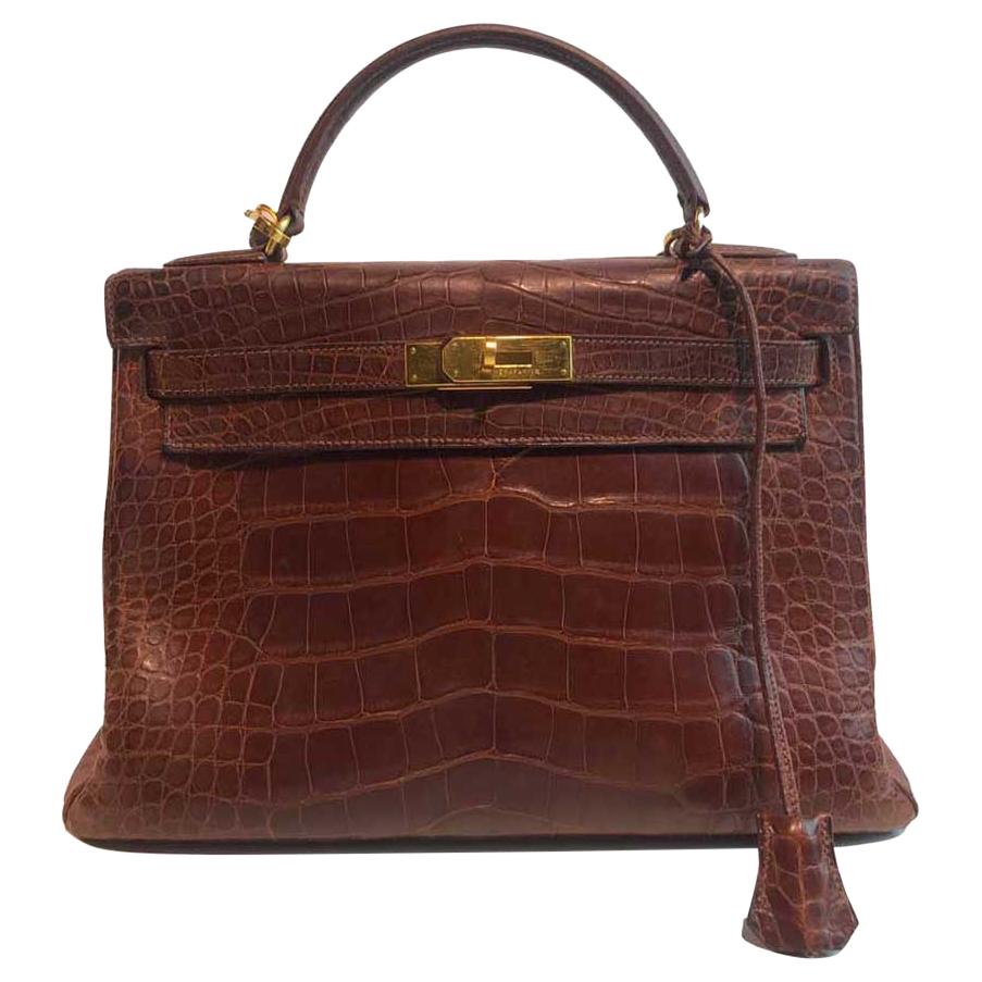 HERMES Kelly 32 Alligator And Golden Jewelry