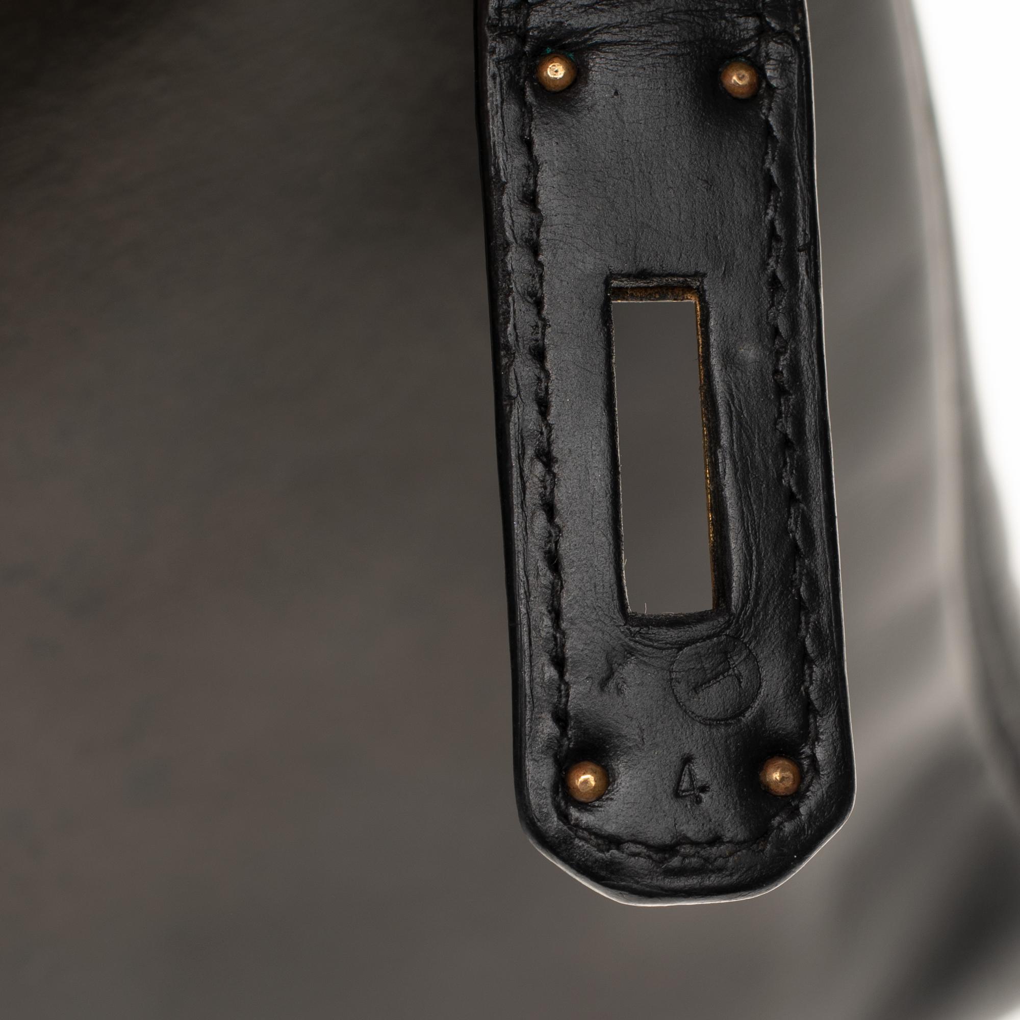 Hermès Kelly 32 cm strap shoulder bag in black calfskin box and gold hardware 1