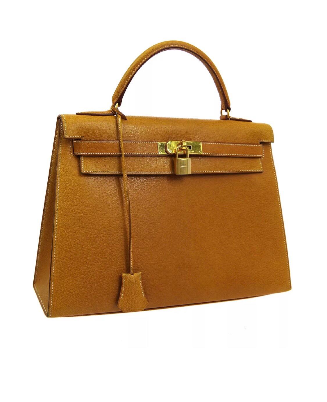 Hermes Kelly 32 Cognac Tan Leather Gold Top Handle Satchel Shoulder Bag

Leather
Gold tone hardware
Leather lining
Date code present
Made in France
Handle drop 3.5