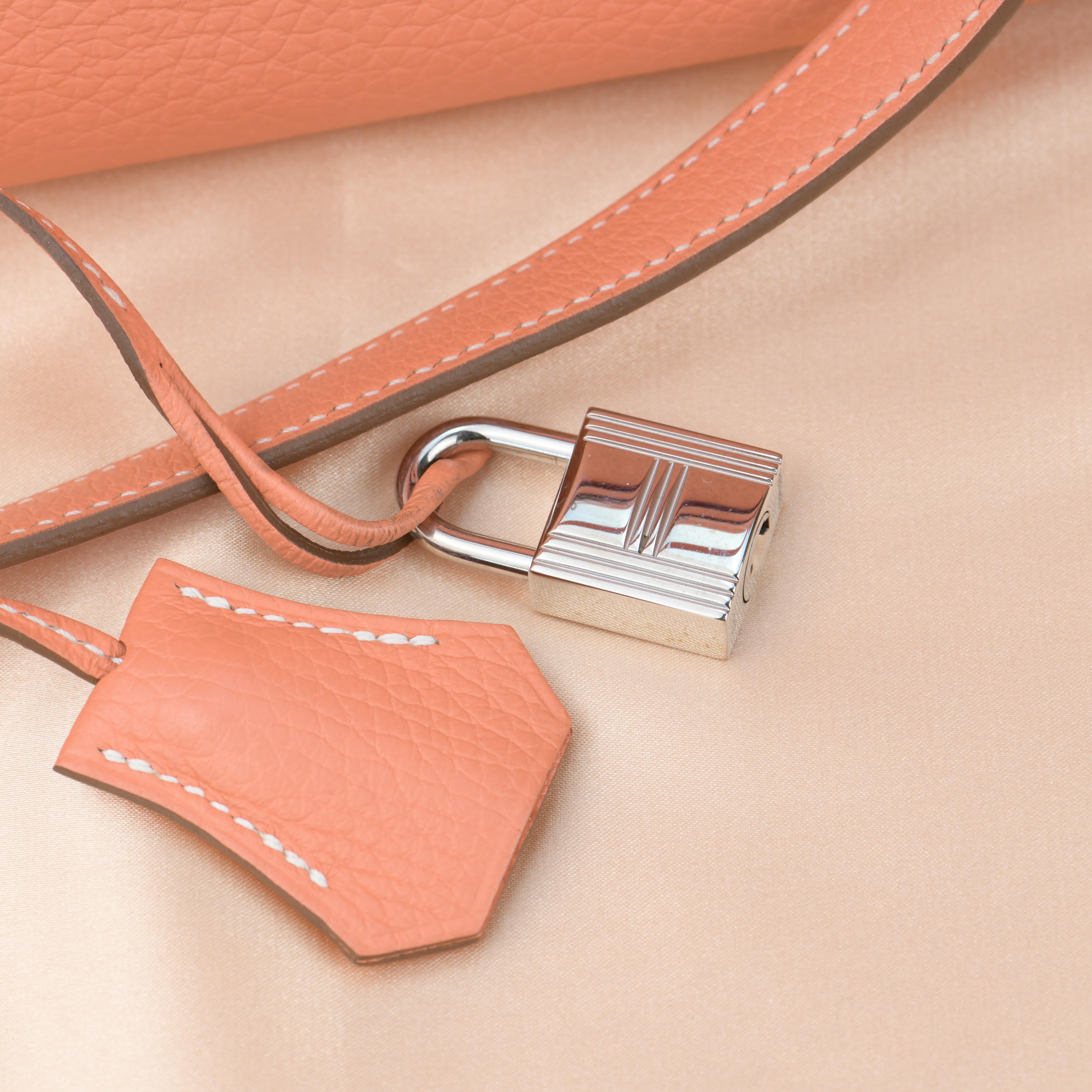 Brand	Hermès
Model	Kelly 32cm
Measurements     	Approx. 32cm L x 24cm H x 12cm D
Leather    Togo 
Date Stamp	Q in a Square	
Color	Crevette
Date	Circa 2013
Metal	Silver Tone
Condition	Mint condition 
Comes with	Keys,Padlock,Clochette

If you are