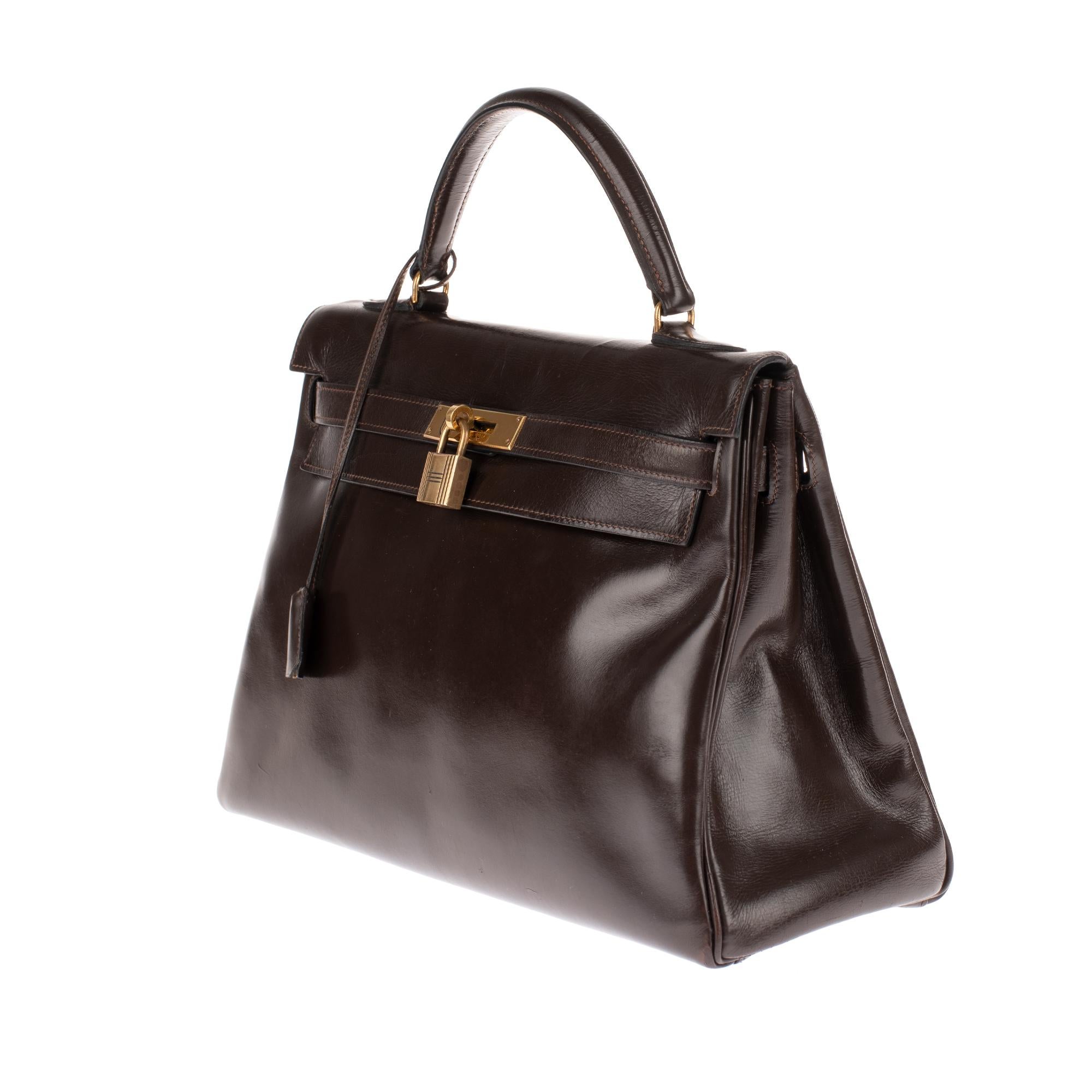 Women's Hermès Kelly 32 handbag in brown calfskin leather with strap and golden hardware