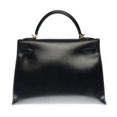 Hermès Kelly 32 handbag with strap in black box calfskin leather, GHW