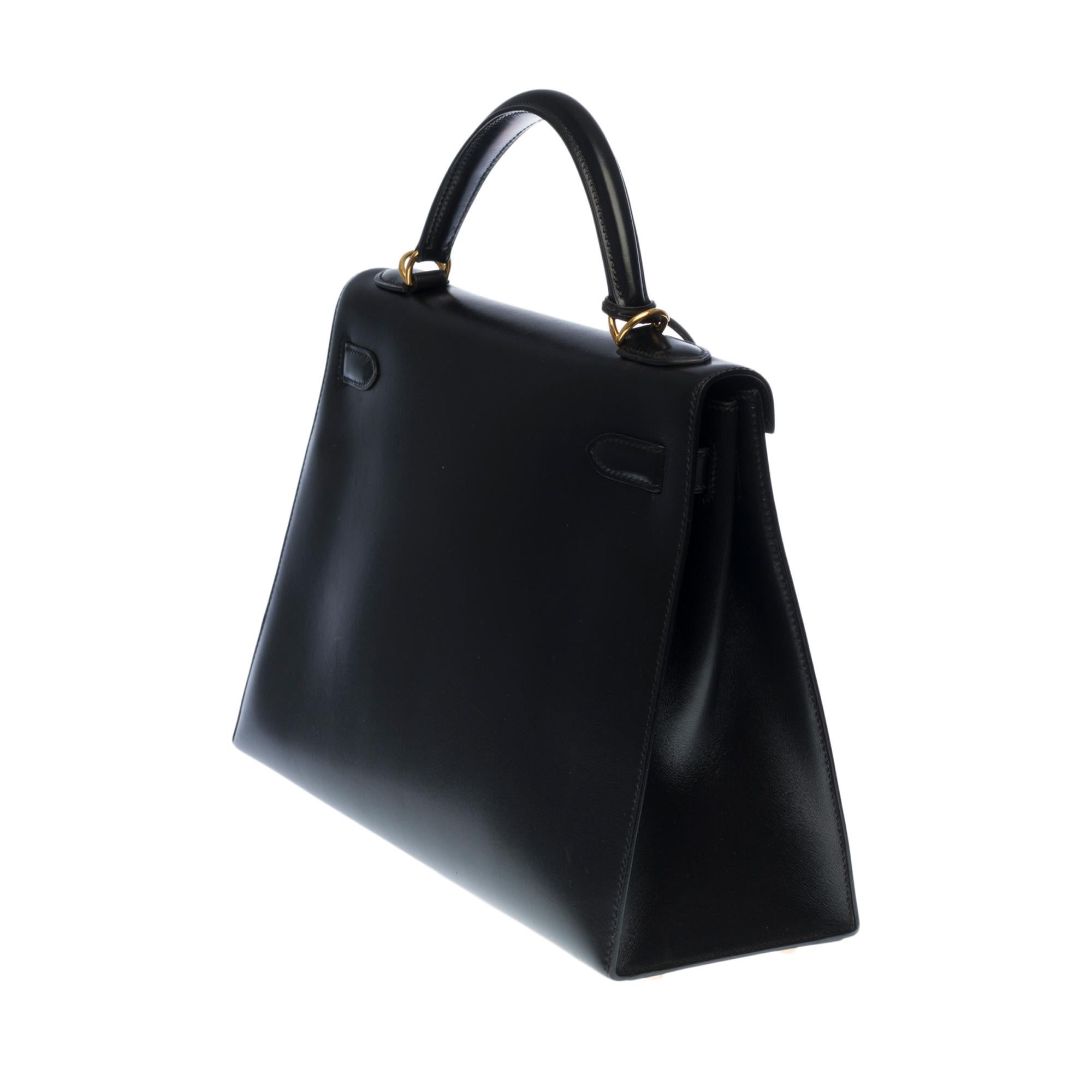 Hermès Kelly 32 handbag with strap in black box calfskin leather, GHW In Good Condition In Paris, IDF