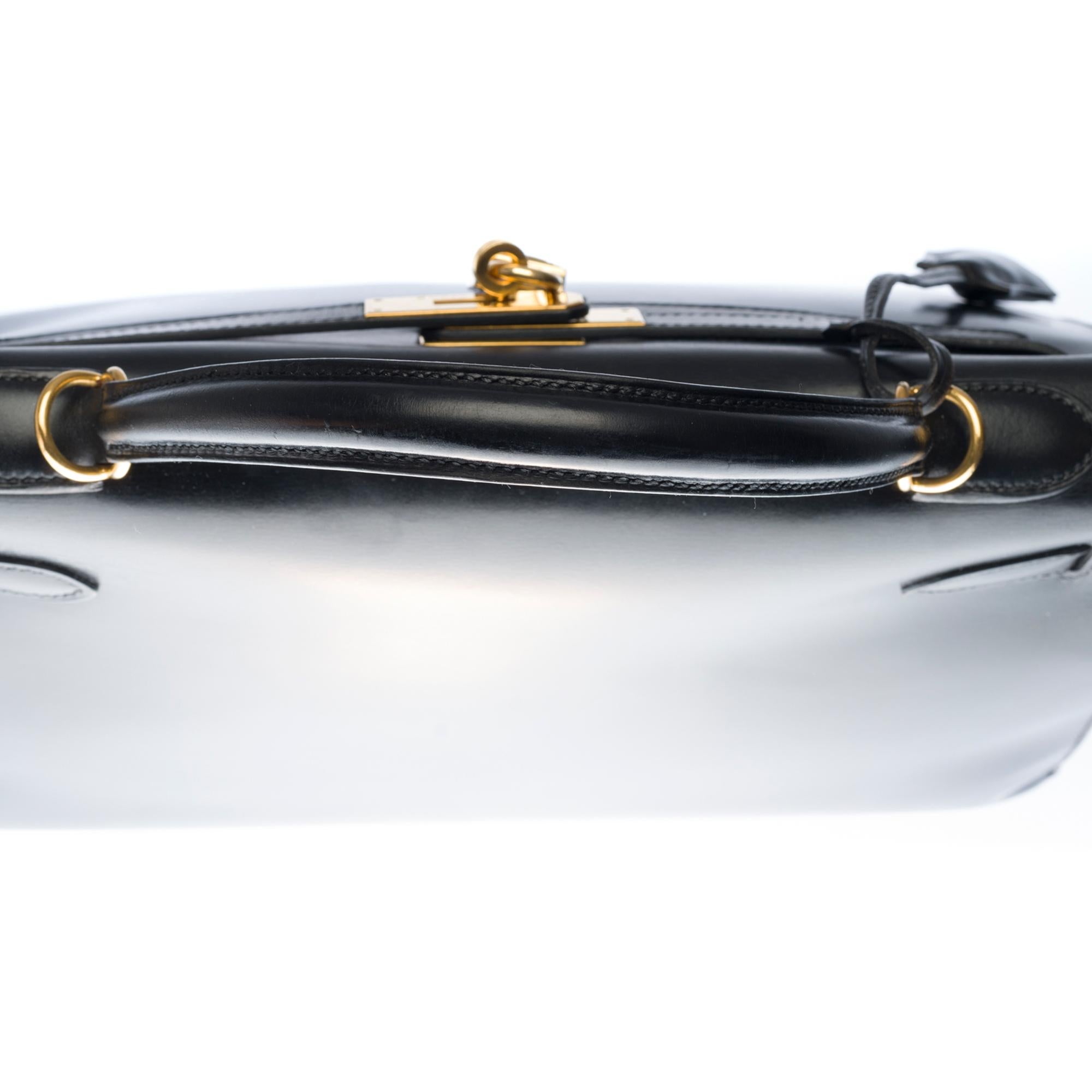 Hermès Kelly 32 handbag with strap in black box calfskin leather, GHW 1