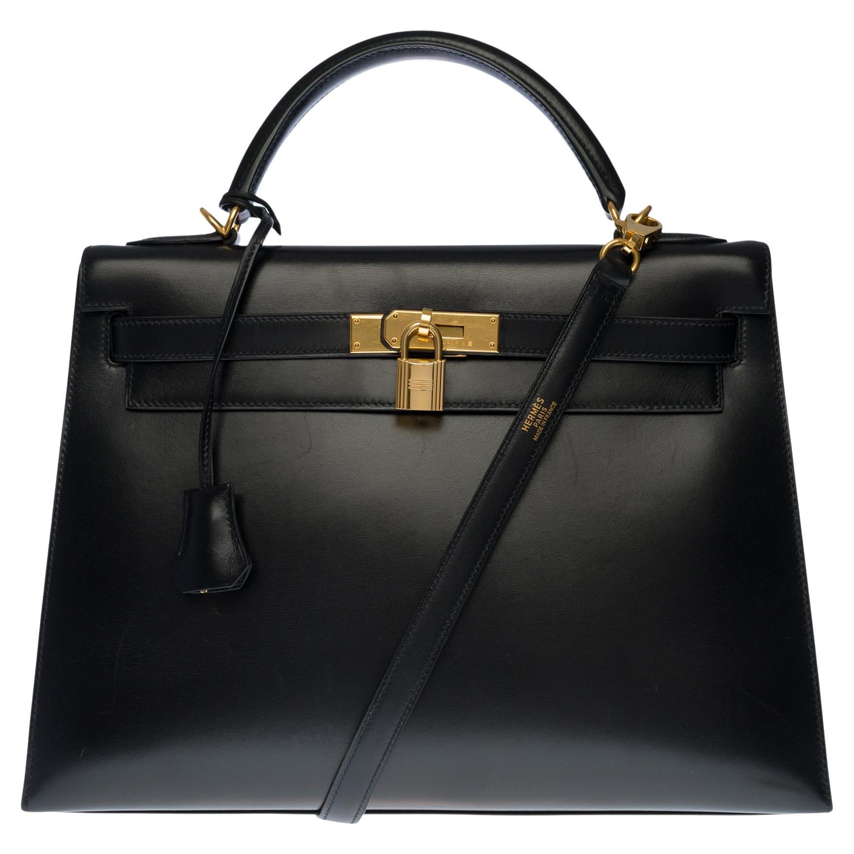 Hermès Kelly 32 handbag with strap in black box calfskin leather, GHW