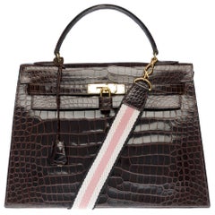 Hermès Kelly 32 handbag with strap in brown Porosus crocodile, GHW