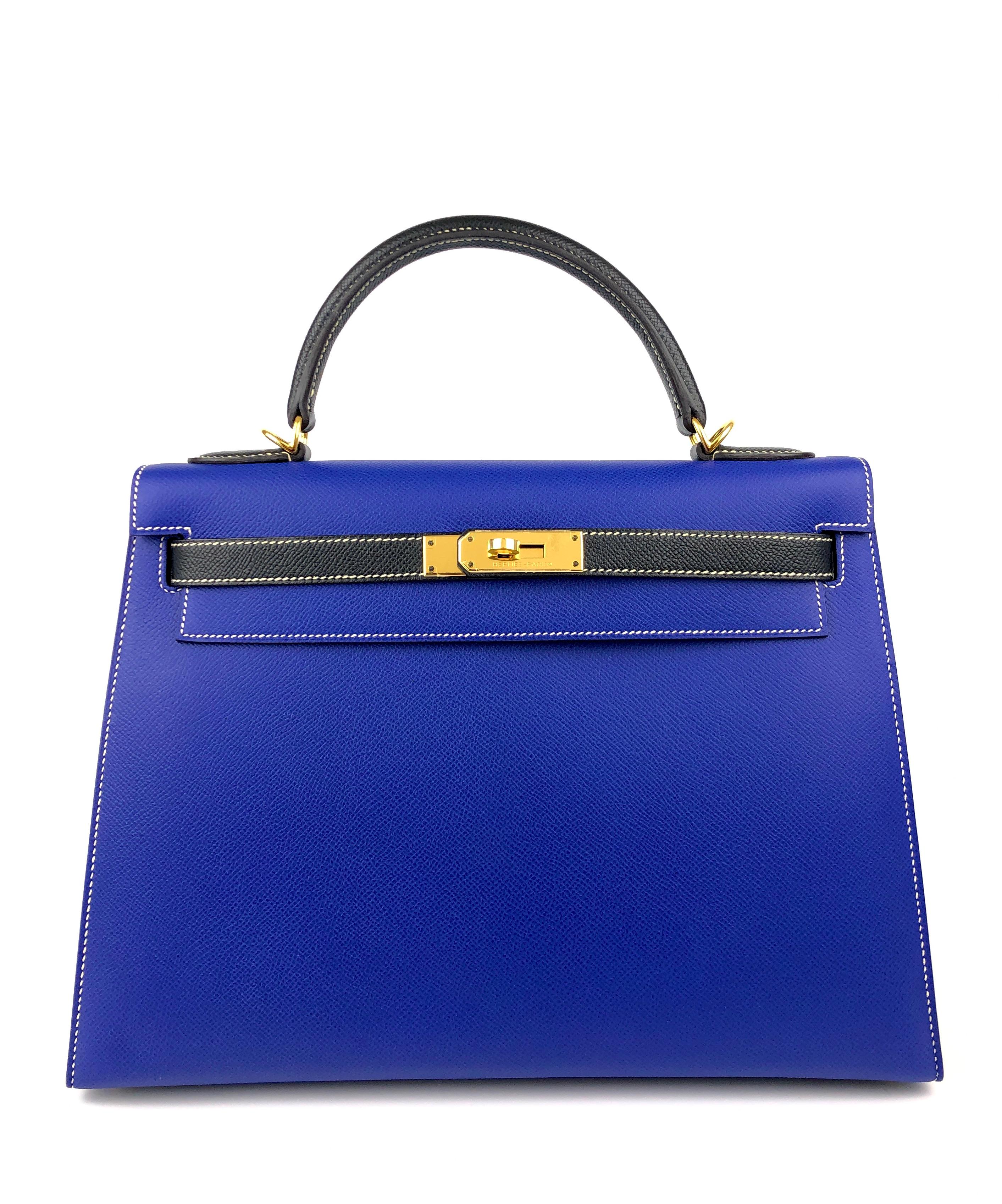 Absolutely Stunning Hermes Kelly 32 HSS Special Order Sellier Epsom Blue Electric & Black with White contrast Stitching. Gold Hardware. Pristine Condition Almost Like New! Plastic on Hardware and Feet! 

Shop with confidence from Lux Addicts.