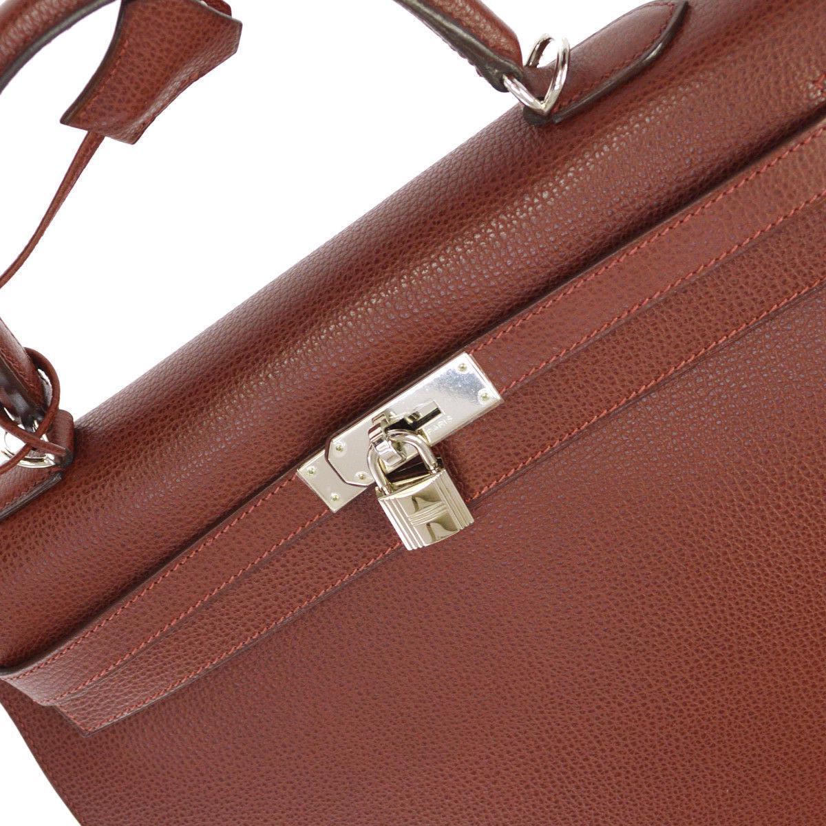 Hermes Kelly 35 Red Leather Palladium Silver Top Handle Satchel Shoulder Bag in Box

Leather
Palladium silver tone hardware
Leather lining
Date code present
Made in France
Handle drop 3.5