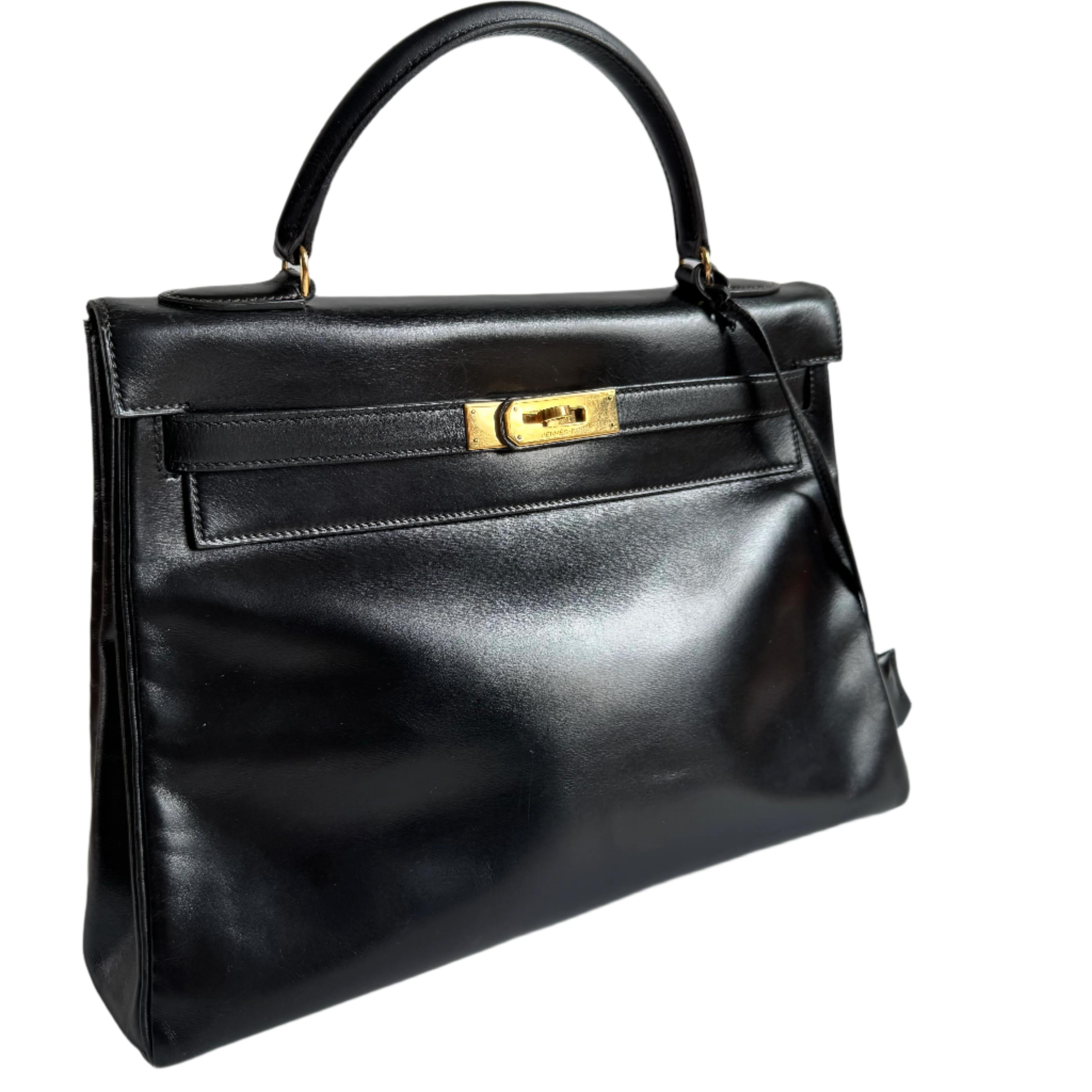 Nero Hermes Kelly 32 Retourne Scatola Nera Pelle Oro HW 1987 in vendita