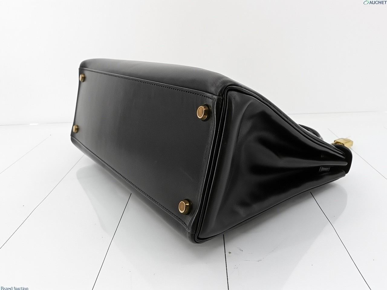 Hermes Kelly 32 Retourne Caja Negra Piel Oro HW 1987 en venta 2