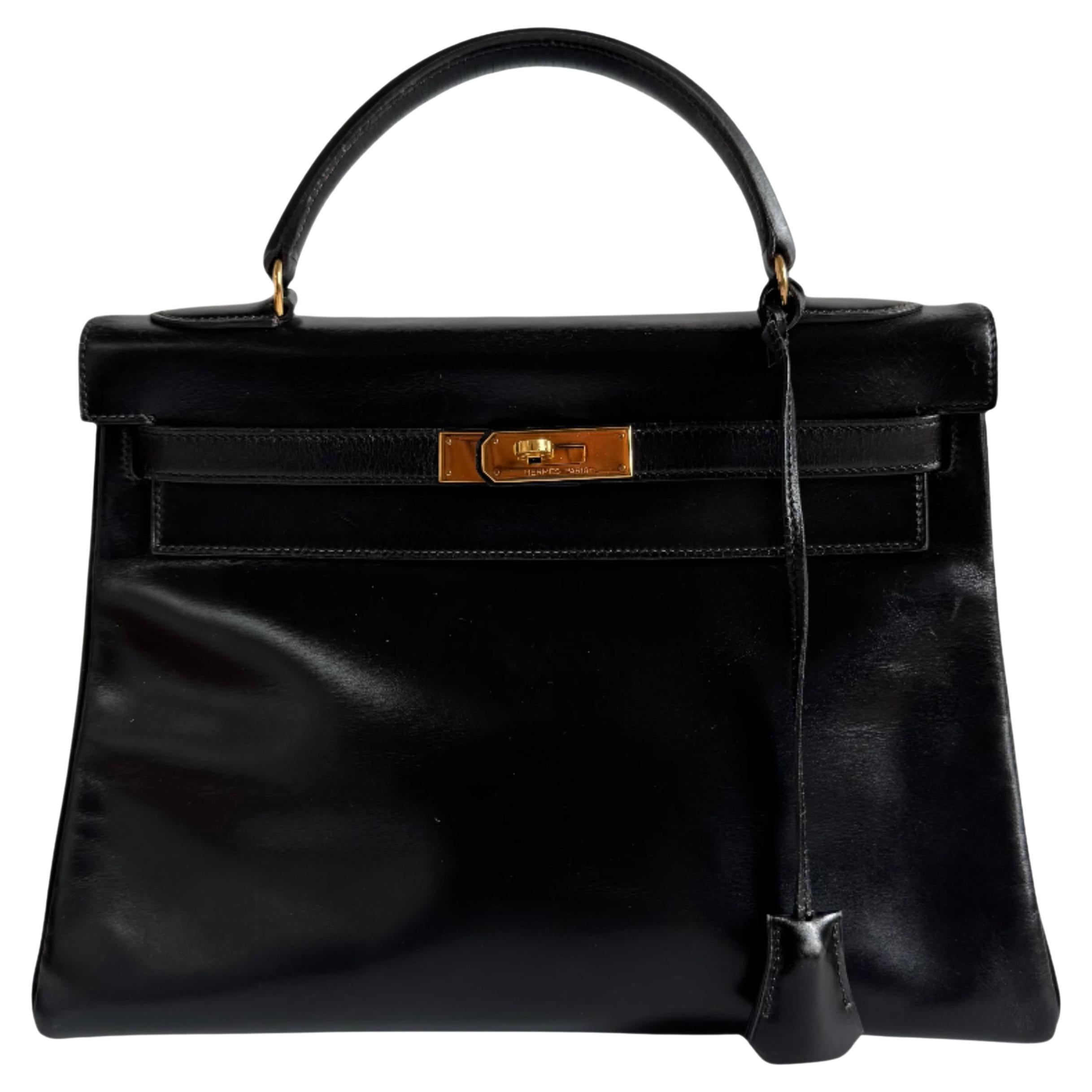 Hermes Kelly 32 Retourne Boîte noire Cuir Or HW 1987