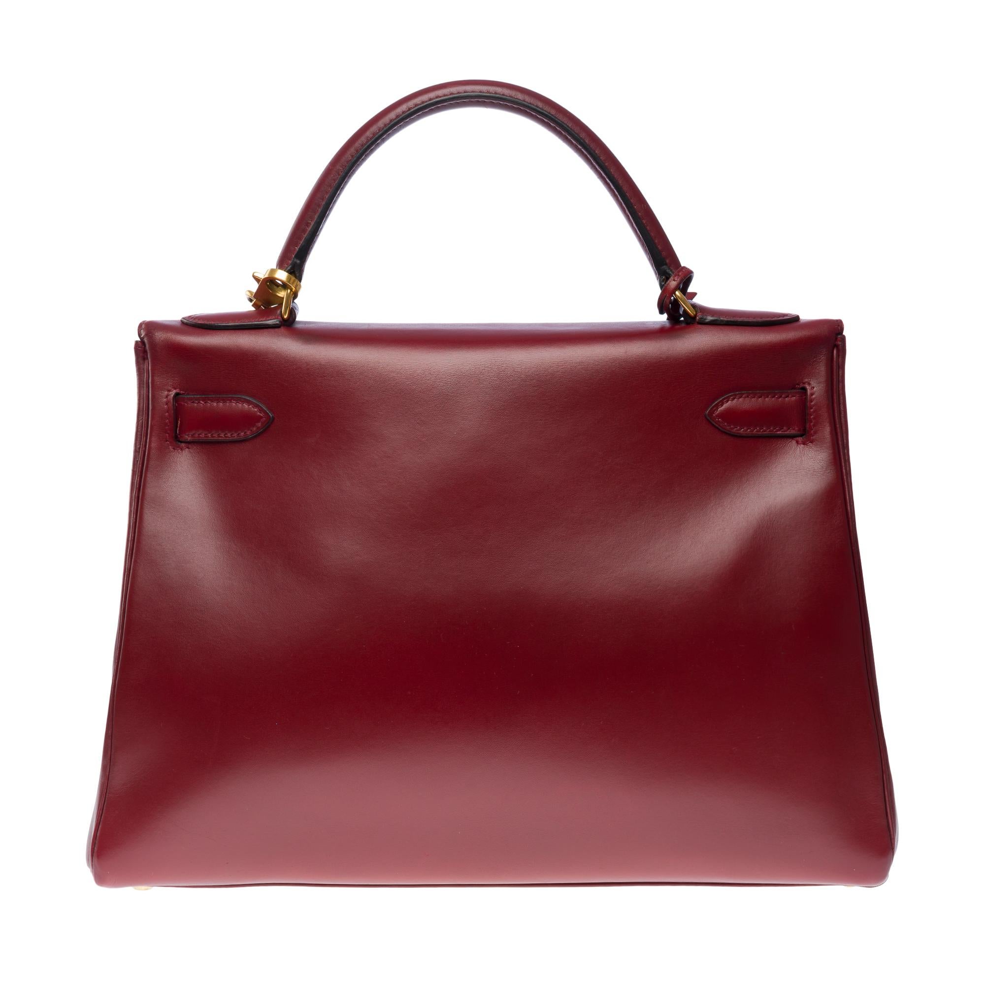 Hermès Kelly 32 retourne handbag strap in Burgundy box calfskin leather, GHW In Good Condition In Paris, IDF