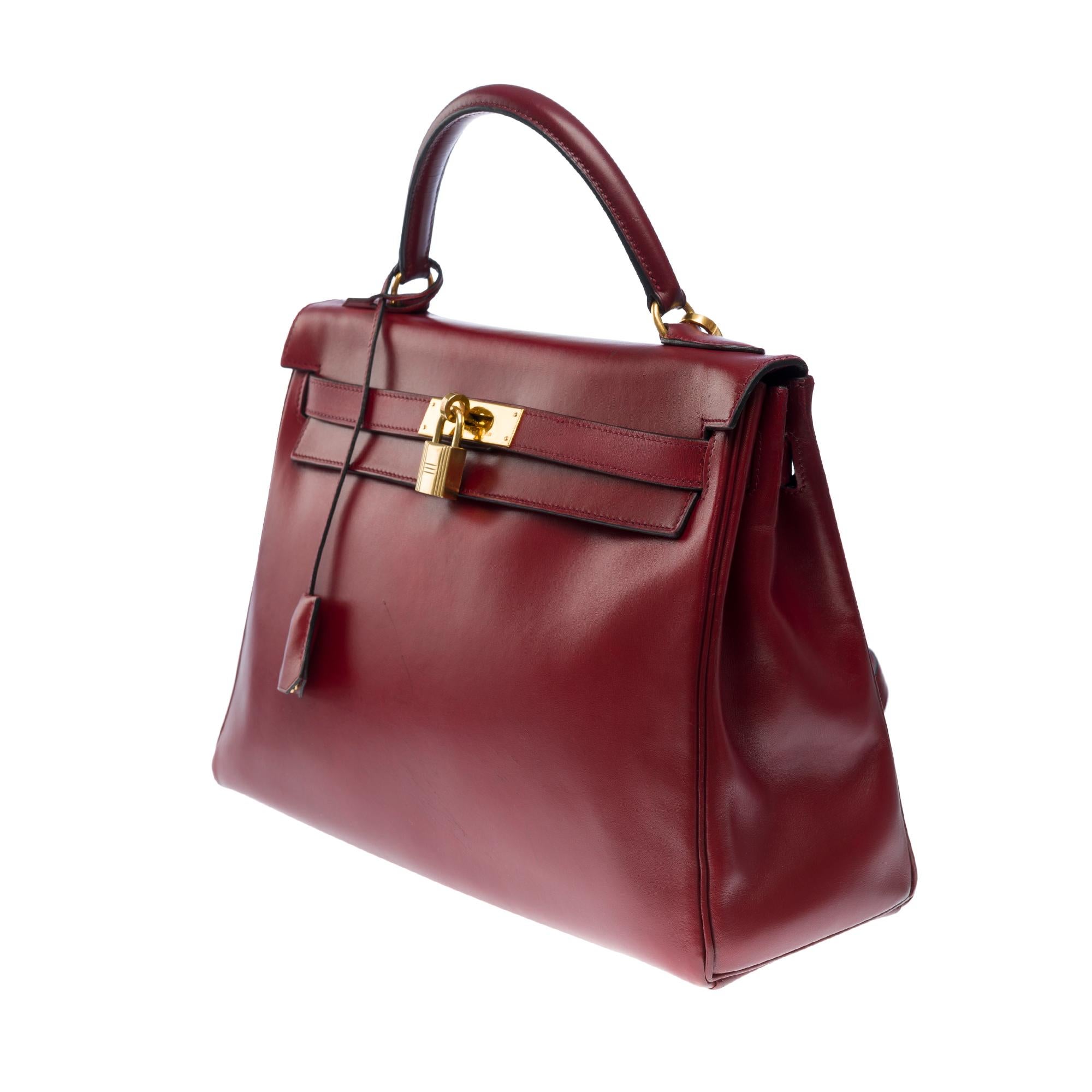 Women's or Men's Hermès Kelly 32 retourne handbag strap in Burgundy box calfskin leather, GHW