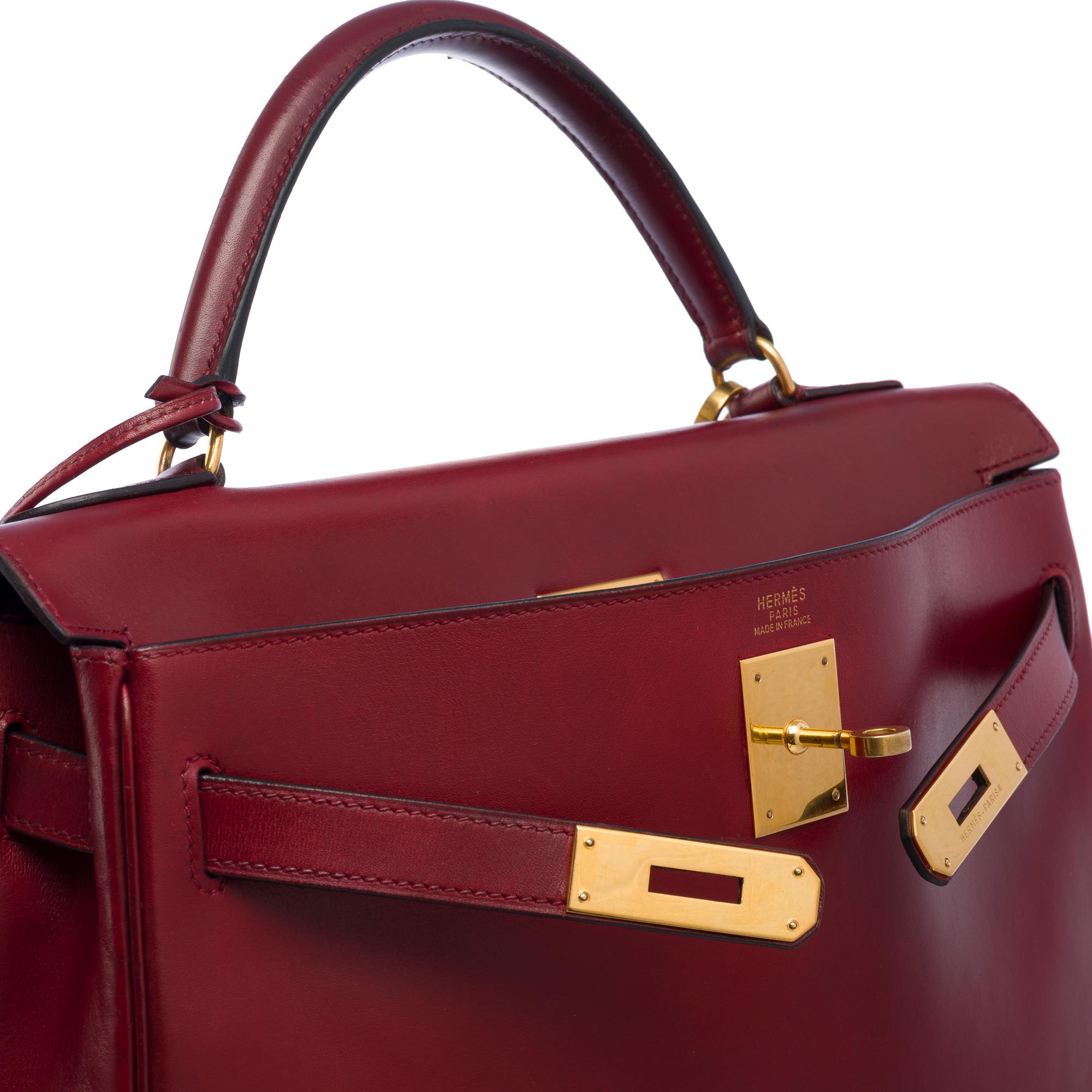 Hermès Kelly 32 retourne handbag strap in Burgundy box calfskin leather, GHW 2
