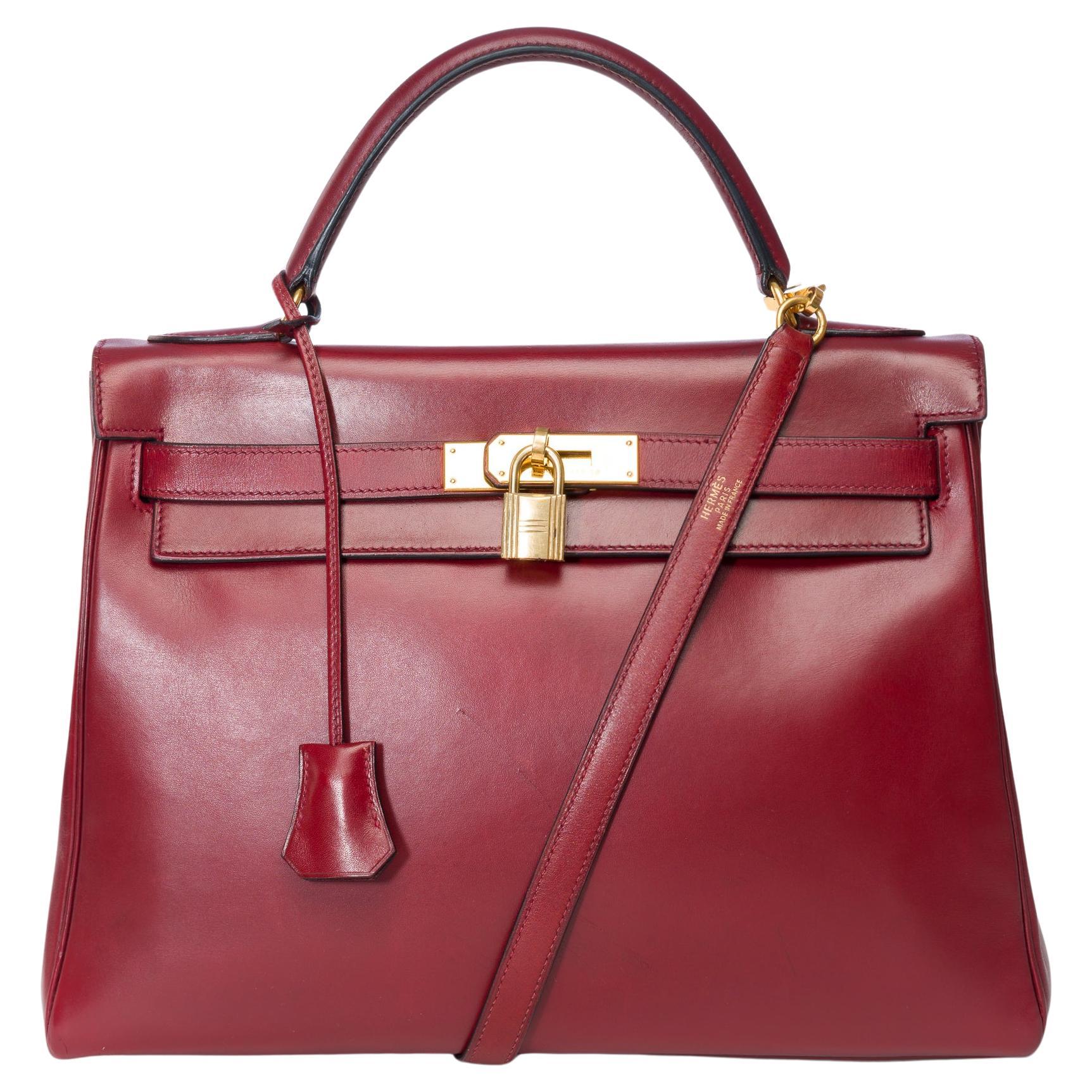 Hermès Kelly 32 retourne handbag strap in Burgundy box calfskin leather, GHW