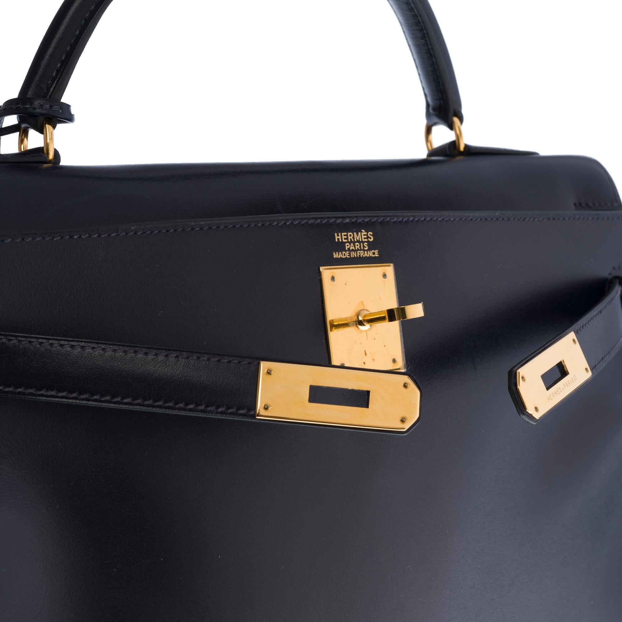 Hermès Kelly 32 retourné handbag with strap in Navy blue calf leather, GHW In Good Condition In Paris, IDF