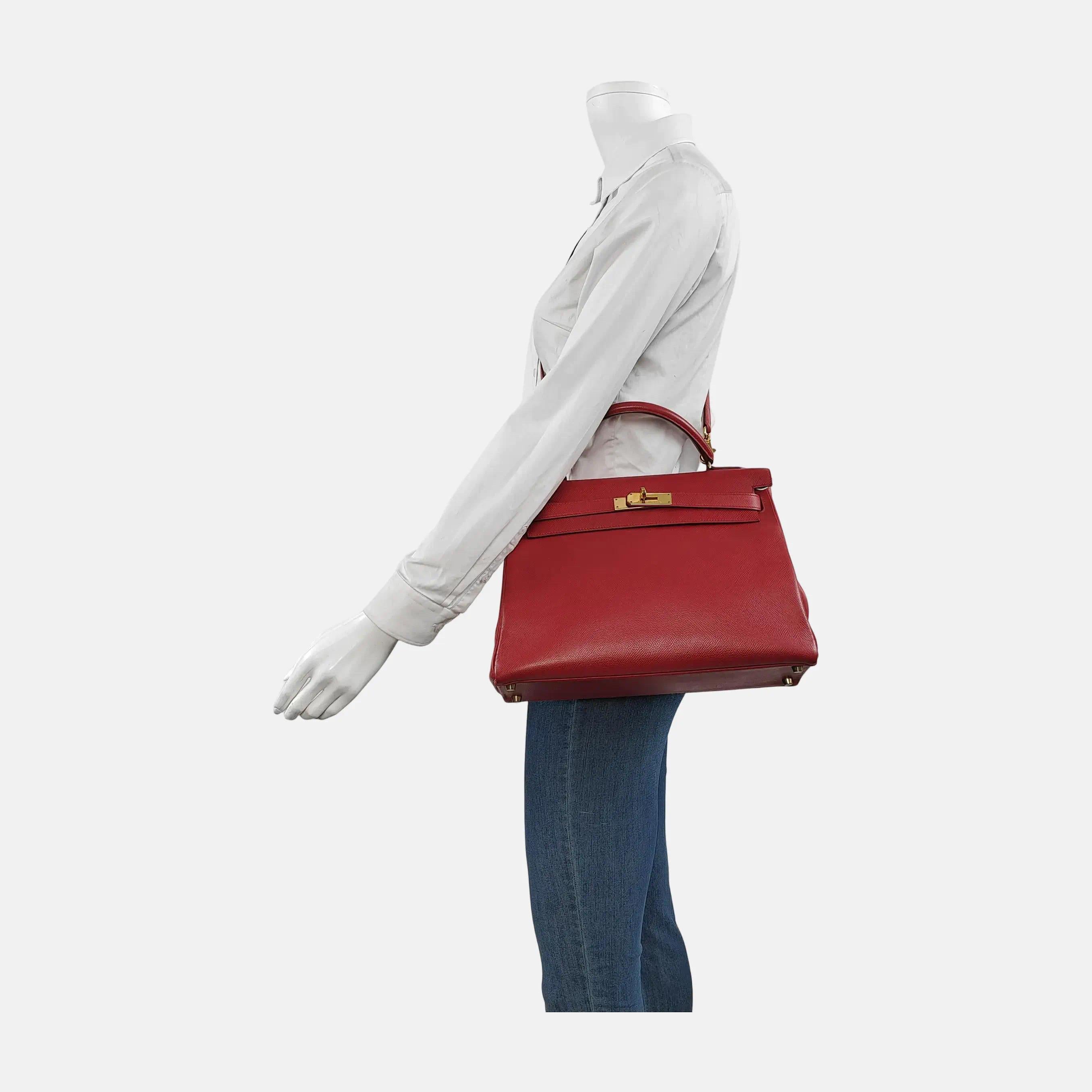 Condition: VERY Good condition.

Overall signs of use. Scratches on leather and hardware. Light stains on the inside. Rubbing around the corners. The color was professionally touched up. 

DETAILS

Brand: Hermes
Kelly 32
Retourne

Stamp: Box A
Year