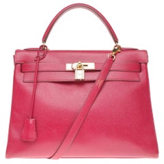 Hermès Kelly 32 retourné shoulder bag in red courchevel leather, gold hardware