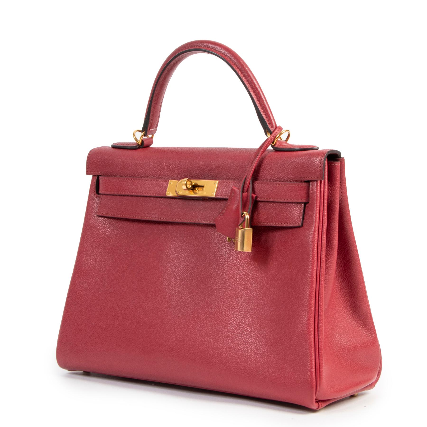 Very good condition

Hermes Kelly 32 Rouge Grenat Veau Evercolor GHW

Renamed after the princess of Monaco, Grace Kelly, the Hermès Kelly is one of most trendy sized and hard-to-get bag. The vibrant Rouge Grenat hue of this one will brighten up your