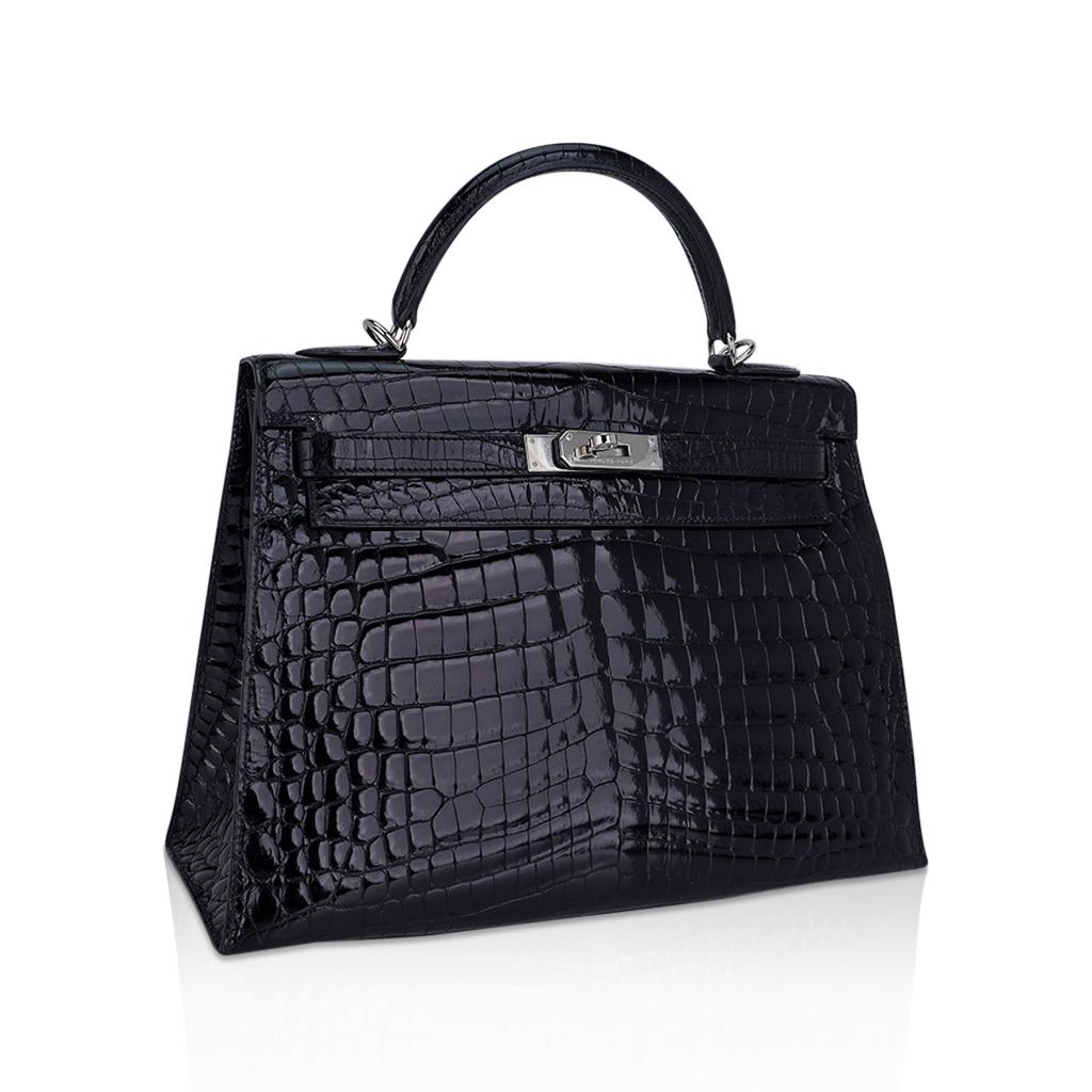 Mightychic offers an Hermes Kelly 32 Sellier bag featured in Black Crocodile.
This timeless classic Hermes Kelly bag is accentuated with crisp Palladium hardware.
This exquisite Kelly is in superior condition. Plastic on hardware.
Comes with strap,