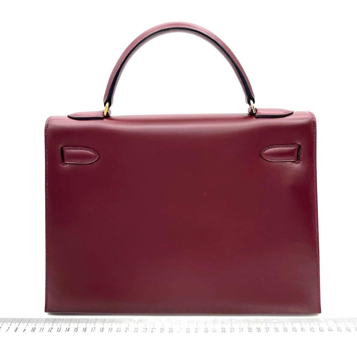 Condition: Good condition.

Overall signs of use. Scratches on leather and hardware. Light stains on the inside. The color was professionally touched up to restore the scuffs and scratches on the leather. 

DETAILS

Brand: Hermès 
Kelly 32
Stamp: H
