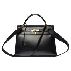 Hermès Kelly 32 Sellier Handtasche mit doppeltem Riemen aus schwarzem Kalbsleder, GHW