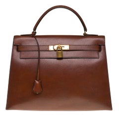 Hermès Kelly 32 sellier Handtasche aus braunem Courchevel Leder und goldenen Beschlägen