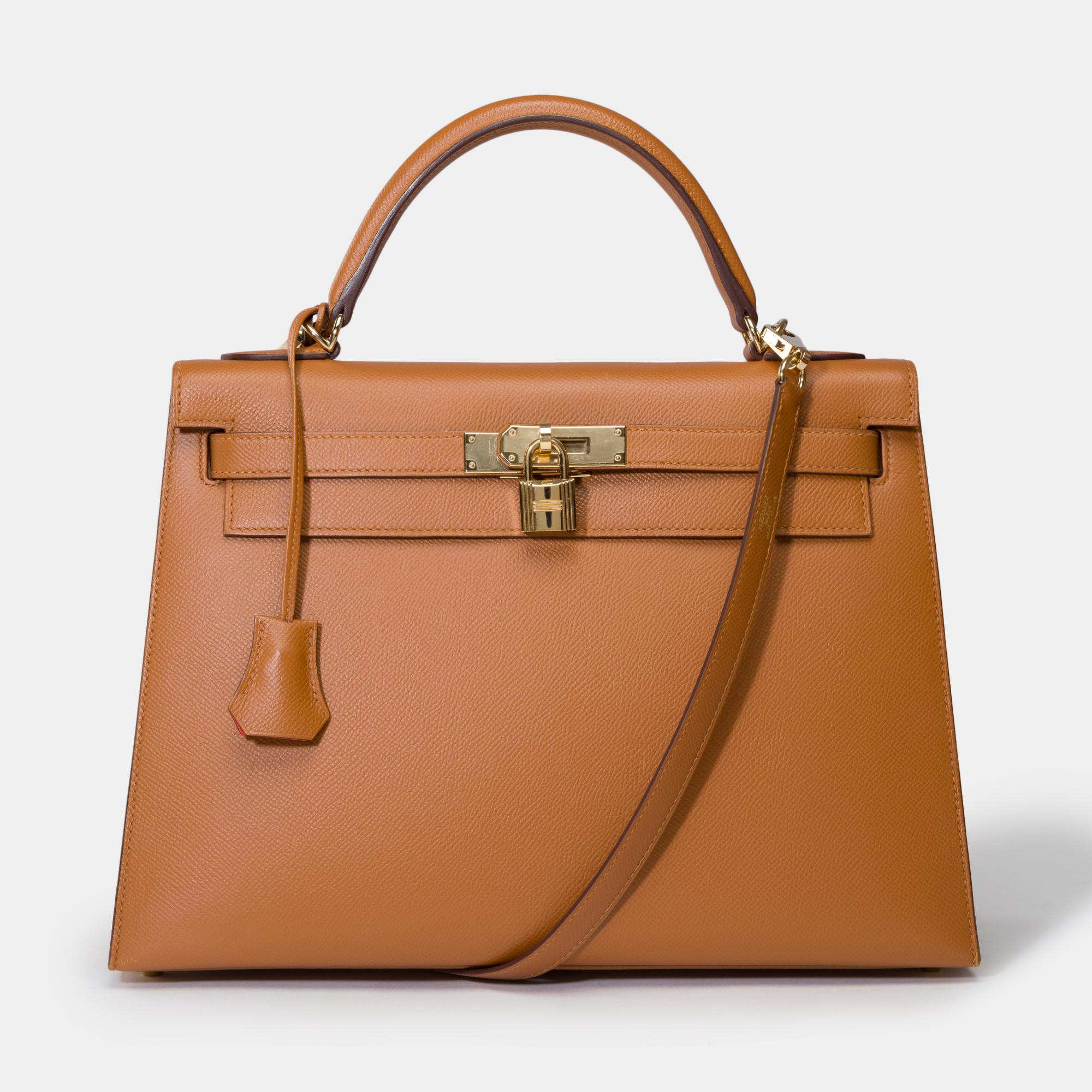 Außergewöhnliche & seltene Hermes Kelly 32 sellier strap Handtasche (Special Order - Horse Shoe HSO) in Camel (Gold) epsom Leder & orange Innenraum, vergoldetes Metall trimmen, Kamelleder Griff, abnehmbarer Schultergurt in Kamelleder für Hand oder