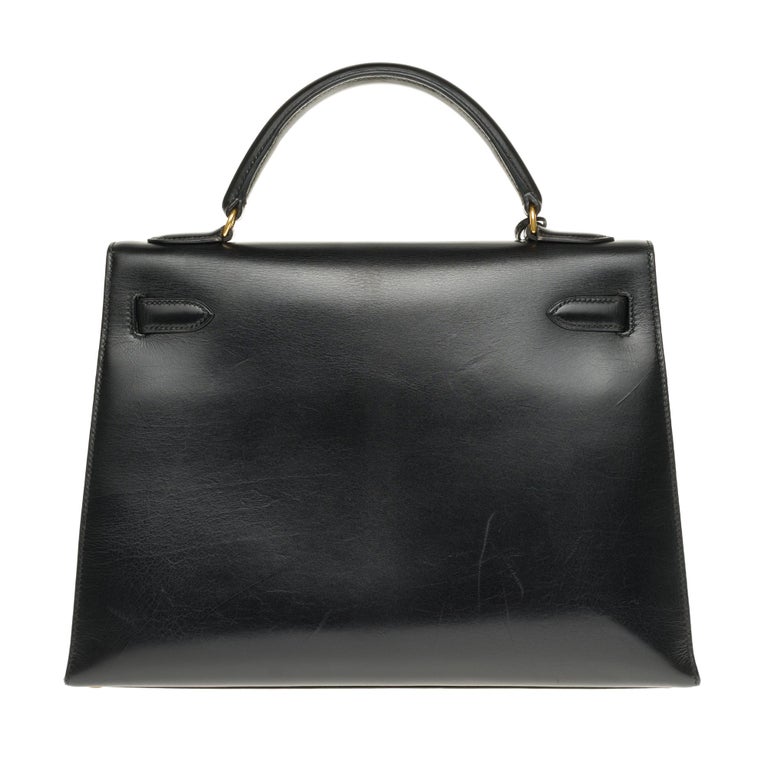 Hermès Kelly 32 sellier with strap in black calfskin with gold hardware ...