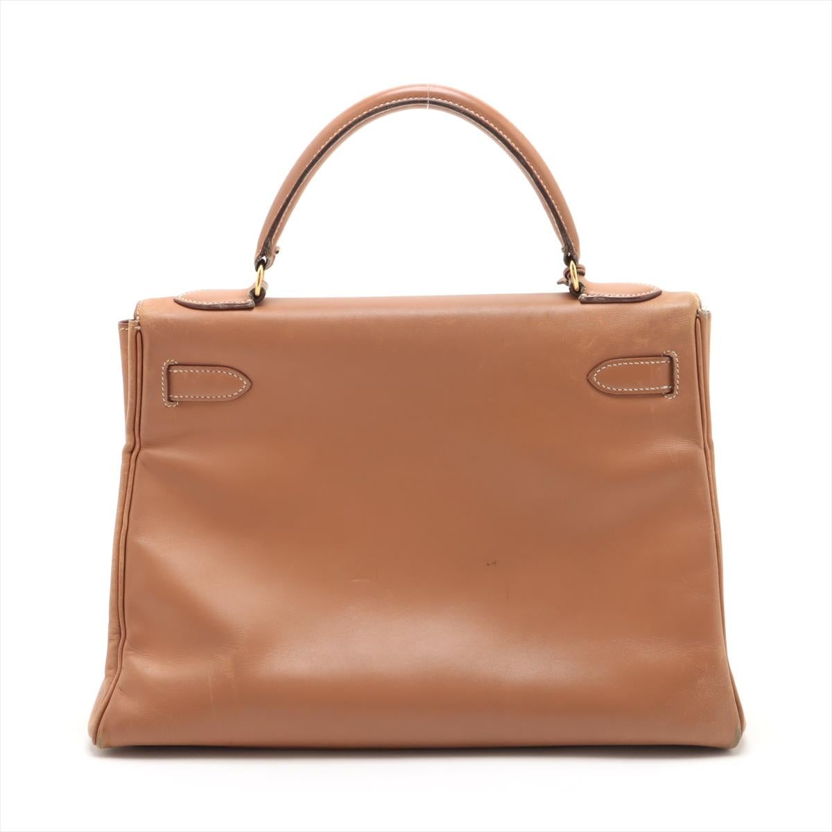 Hermes Kelly 32 Veau Gulliver Gold Brown In Good Condition In Indianapolis, IN