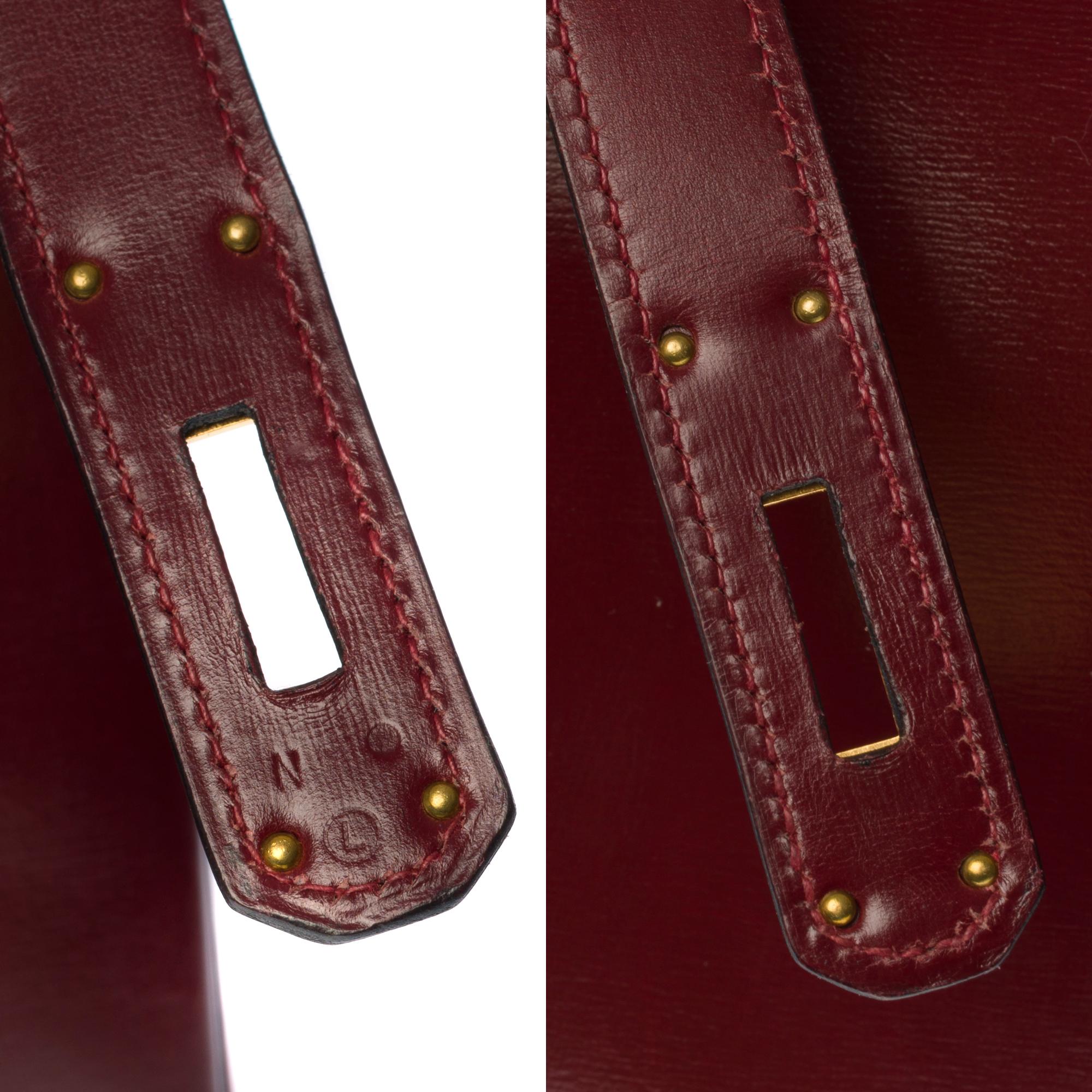 Brown Hermès Kelly 32cm handbag with strap in burgundy calf leather and GHW