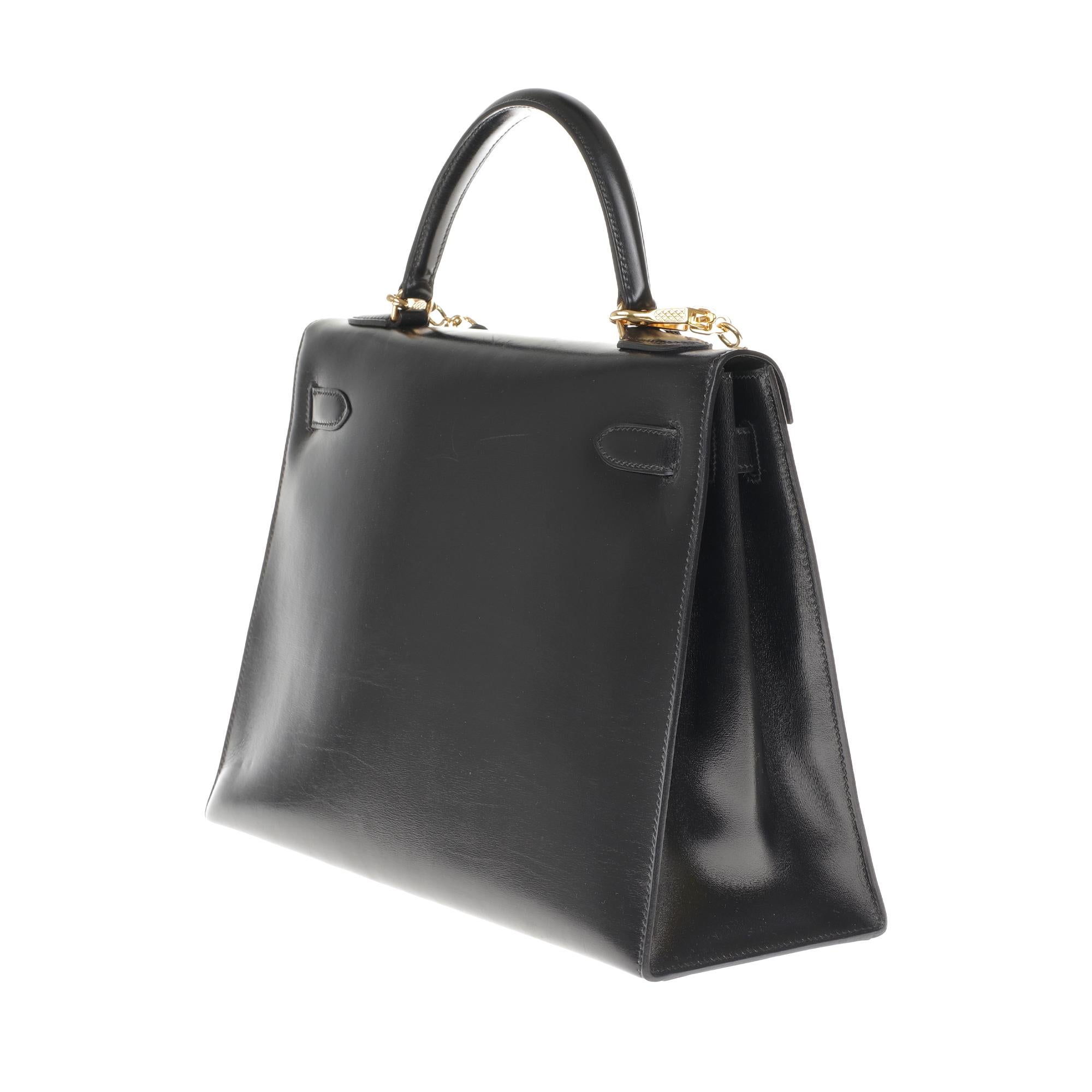 Hermès Kelly 32cm sellier handbag with strap in black calfskin, gold hardware! In Excellent Condition In Paris, IDF