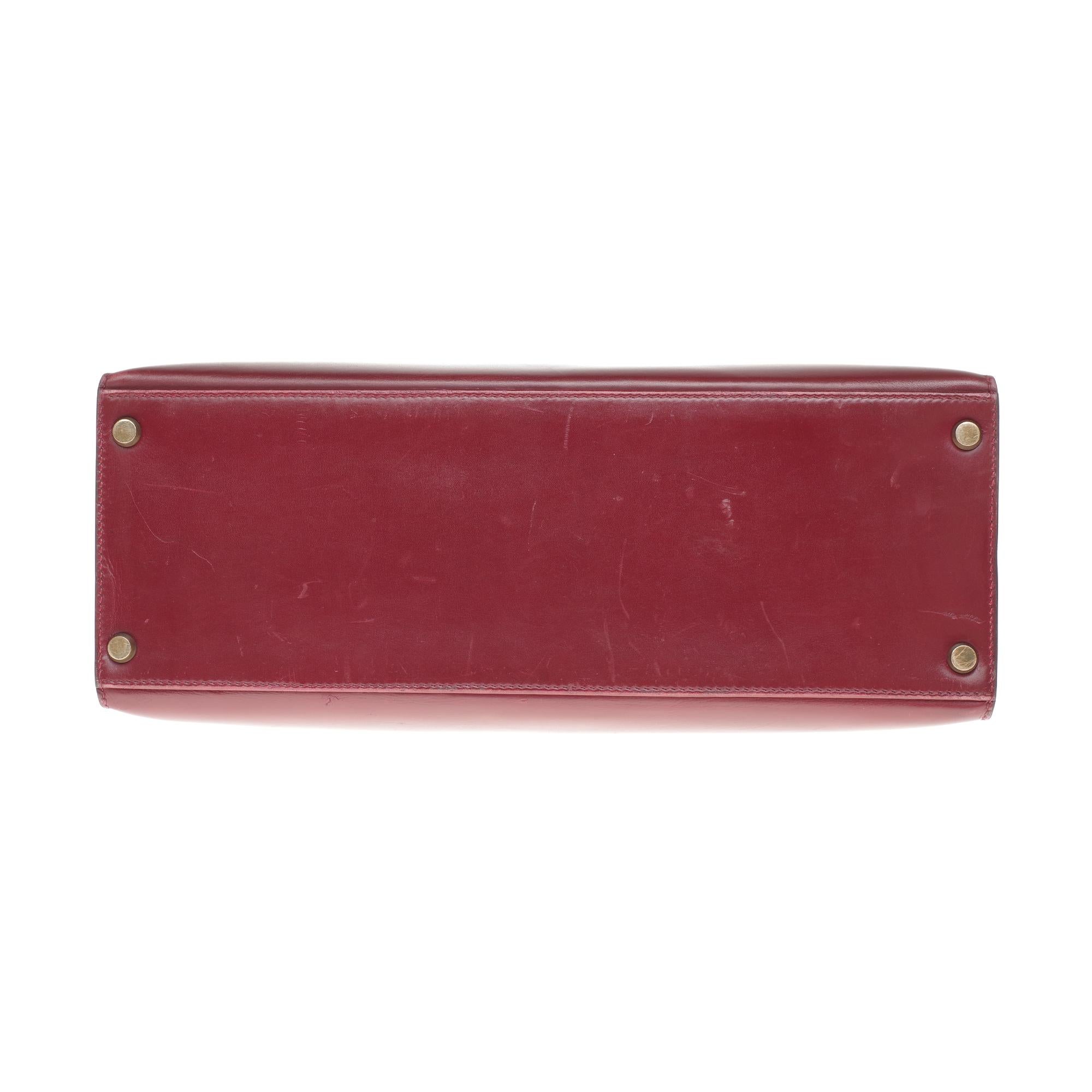Hermès Kelly 32cm sellier handbag with strap in burgundy calfskin, gold hardware 5