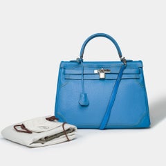 Hermès Kelly 35 "Ghillies" handbag strap in Paradis Blue Togo/Swift leather, SHW