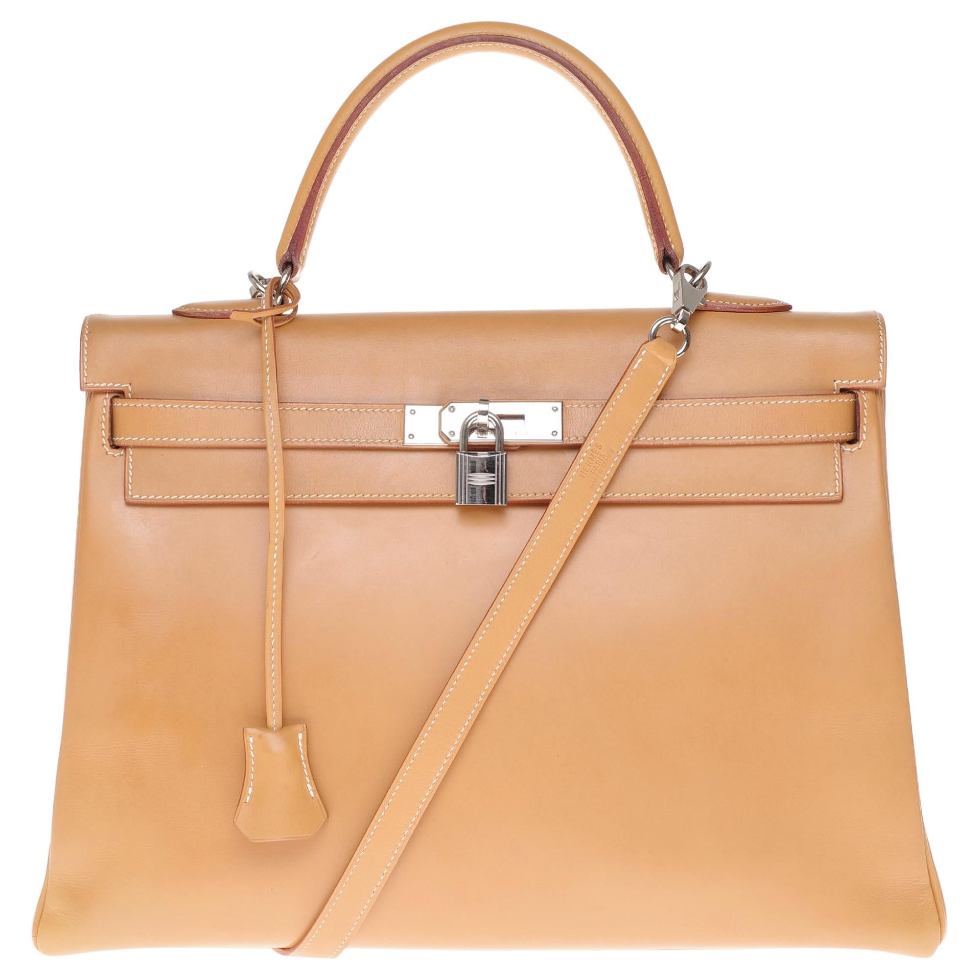 Hermès Kelly 35 handbag in natural calf leather with strap and silver hardware