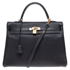 Hermès Kelly 35 handbag with strap in black Togo leather, gold hardware